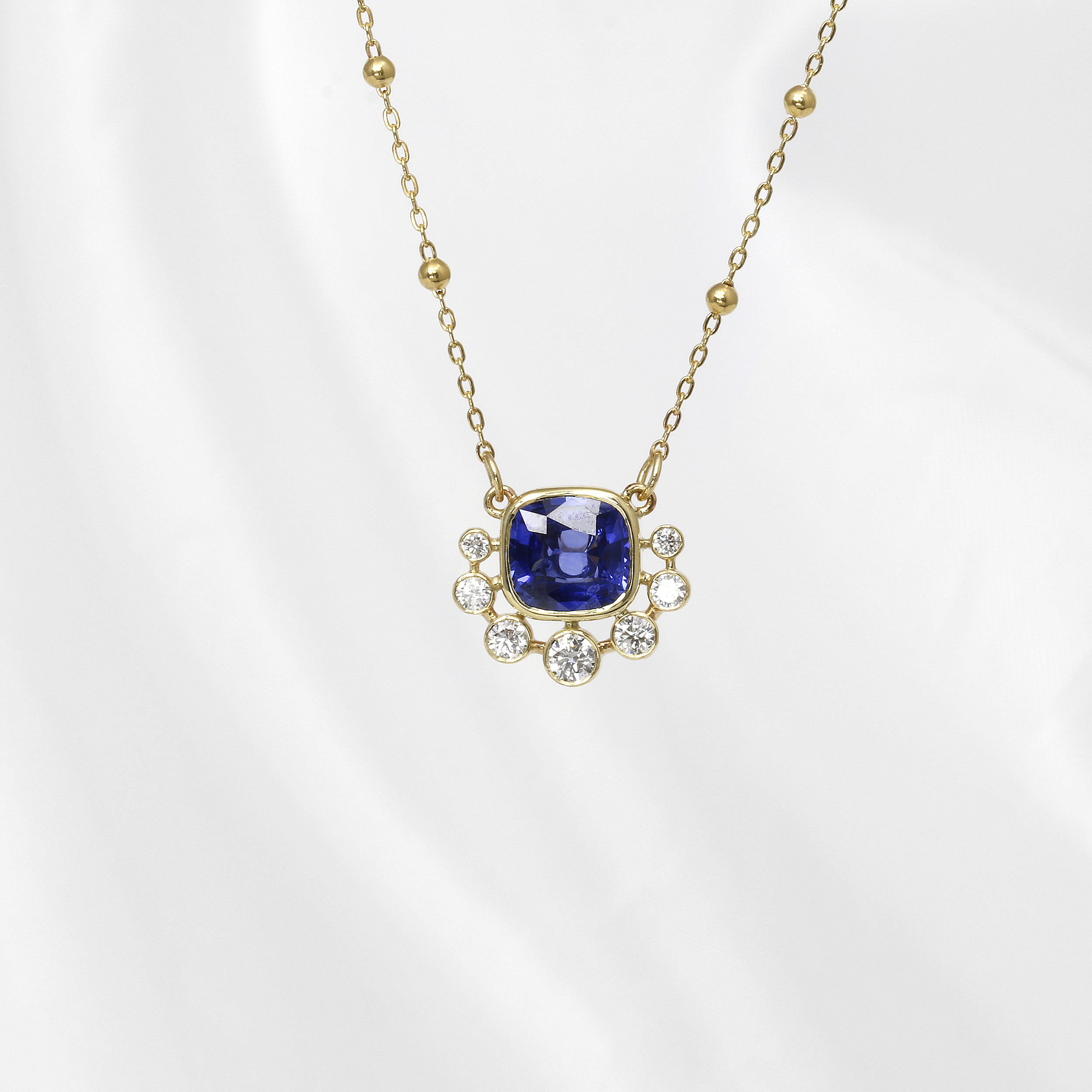 Blue Sapphire and Diamond Pendant in 9ct Yellow Gold