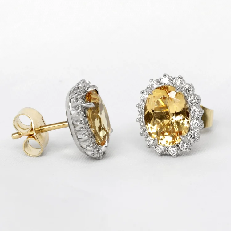 Imperial Topaz in White and Yellow Gold.