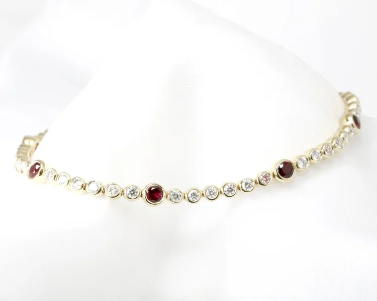 Ruby & Diamond Line Bracelet in Yellow Gold.
