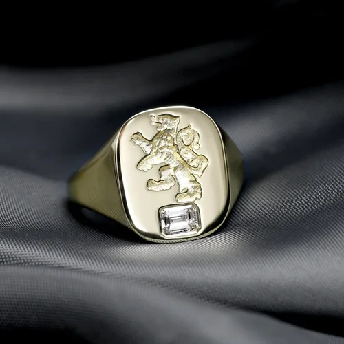 August 2023 - Emerald Cut Diamond in Yellow Gold