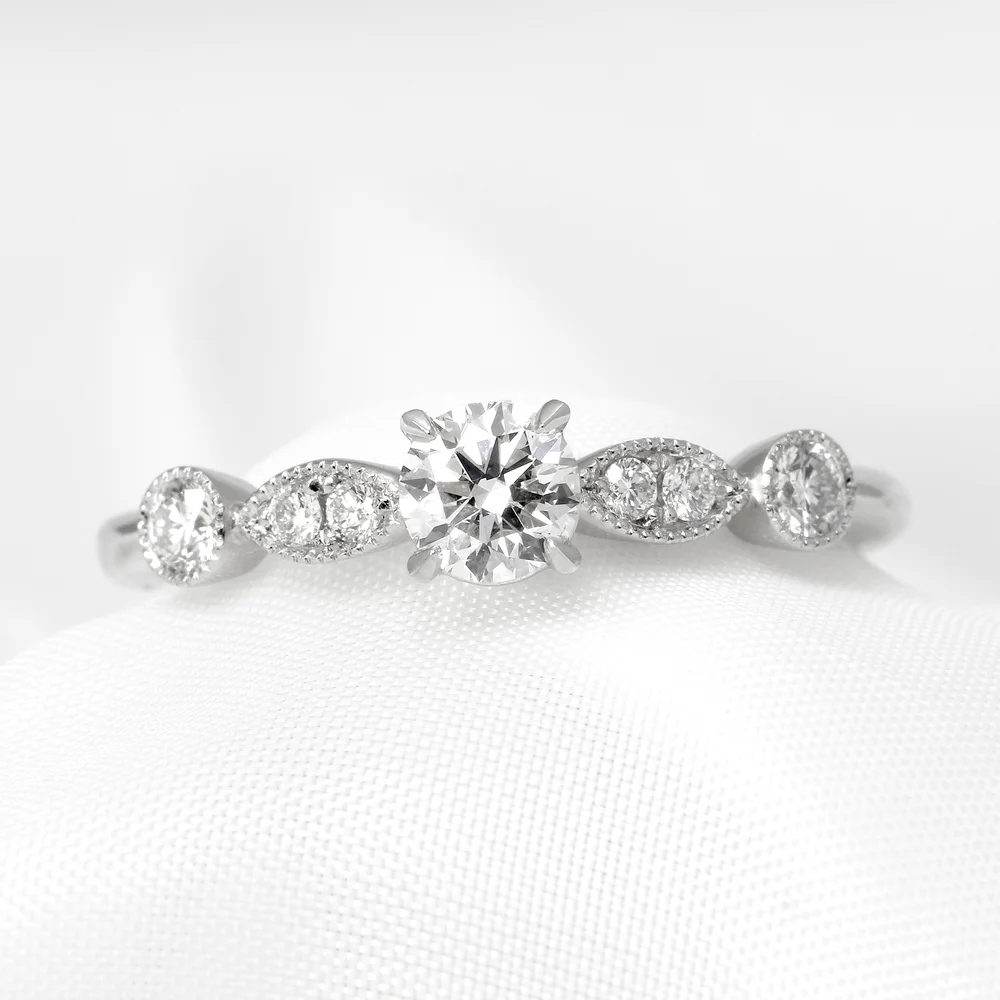 Canadamark Diamond Solitaire Ring with Diamond Set Shoulders