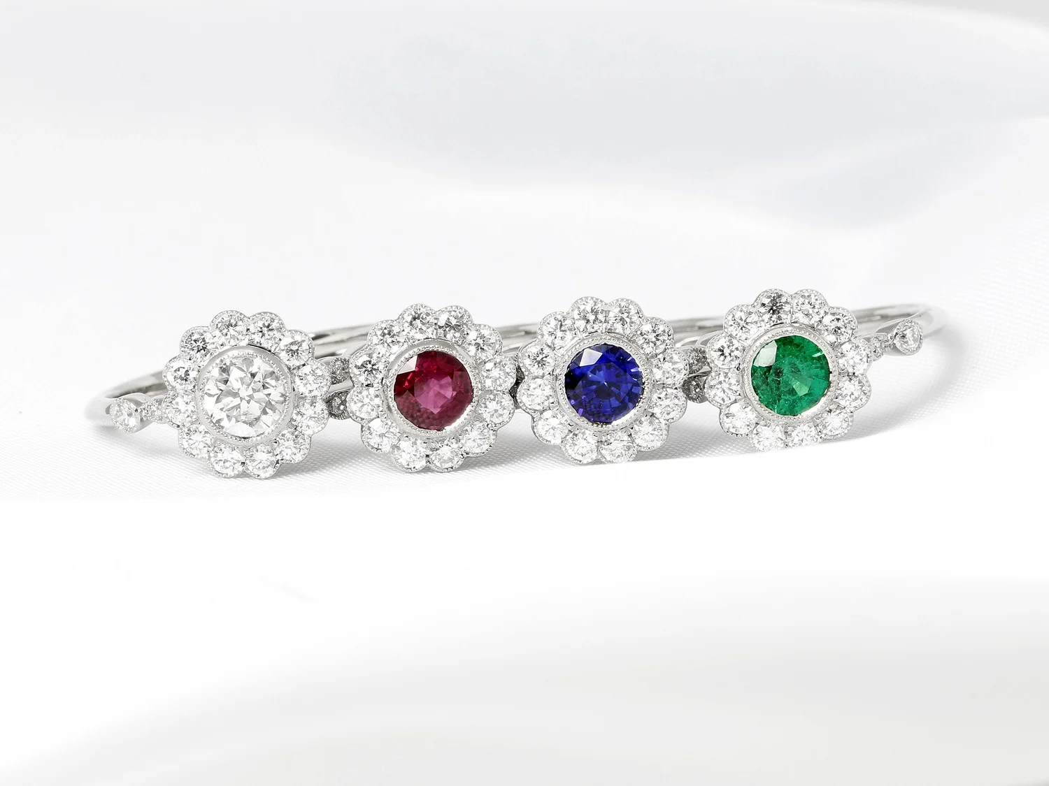 December 2022 - Daisy Edge Cluster Rings with Sapphires, Rubies, Emeralds, Diamonds in Platinum & Yellow Gold