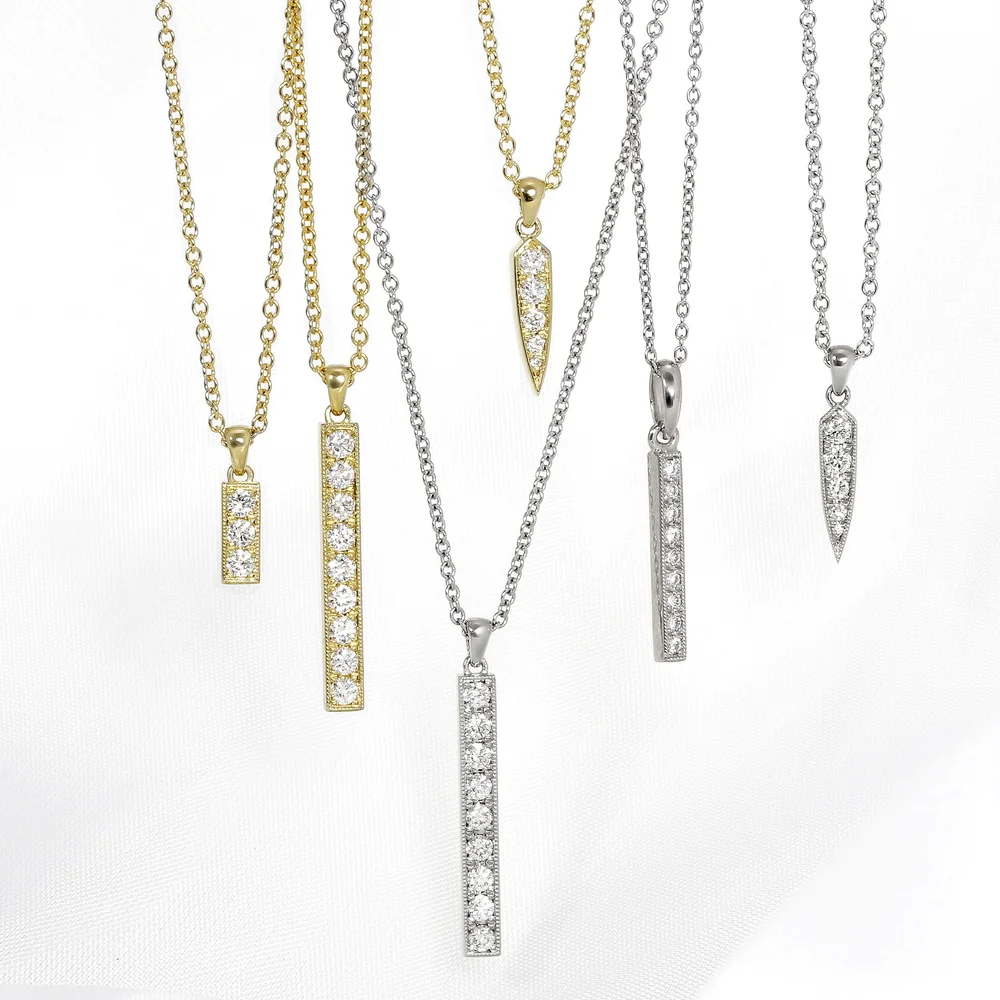 December 2022 - Grain Set Diamond Pendants in Yellow & White Gold