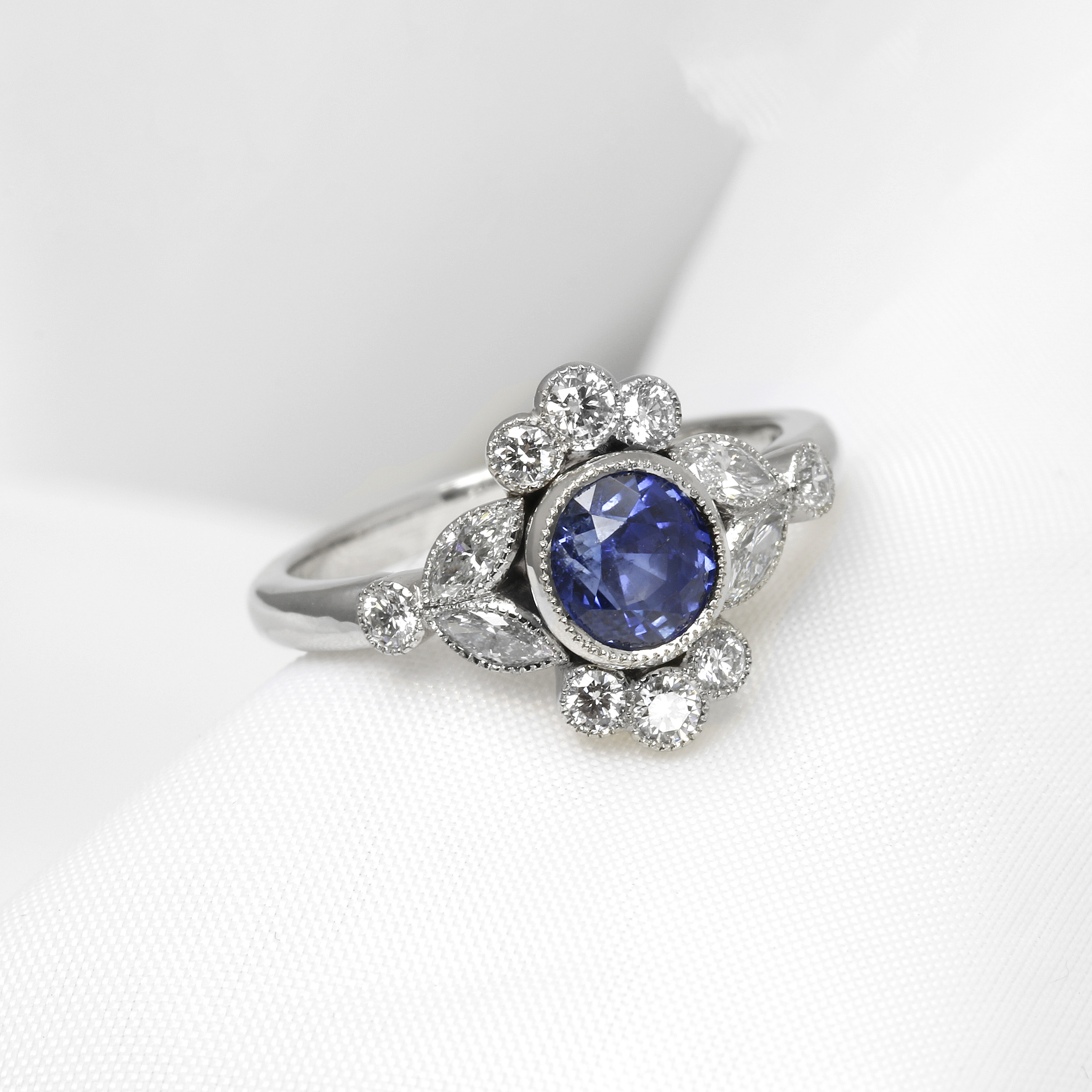 Sapphire and Diamond Cluster Ring in Platinum