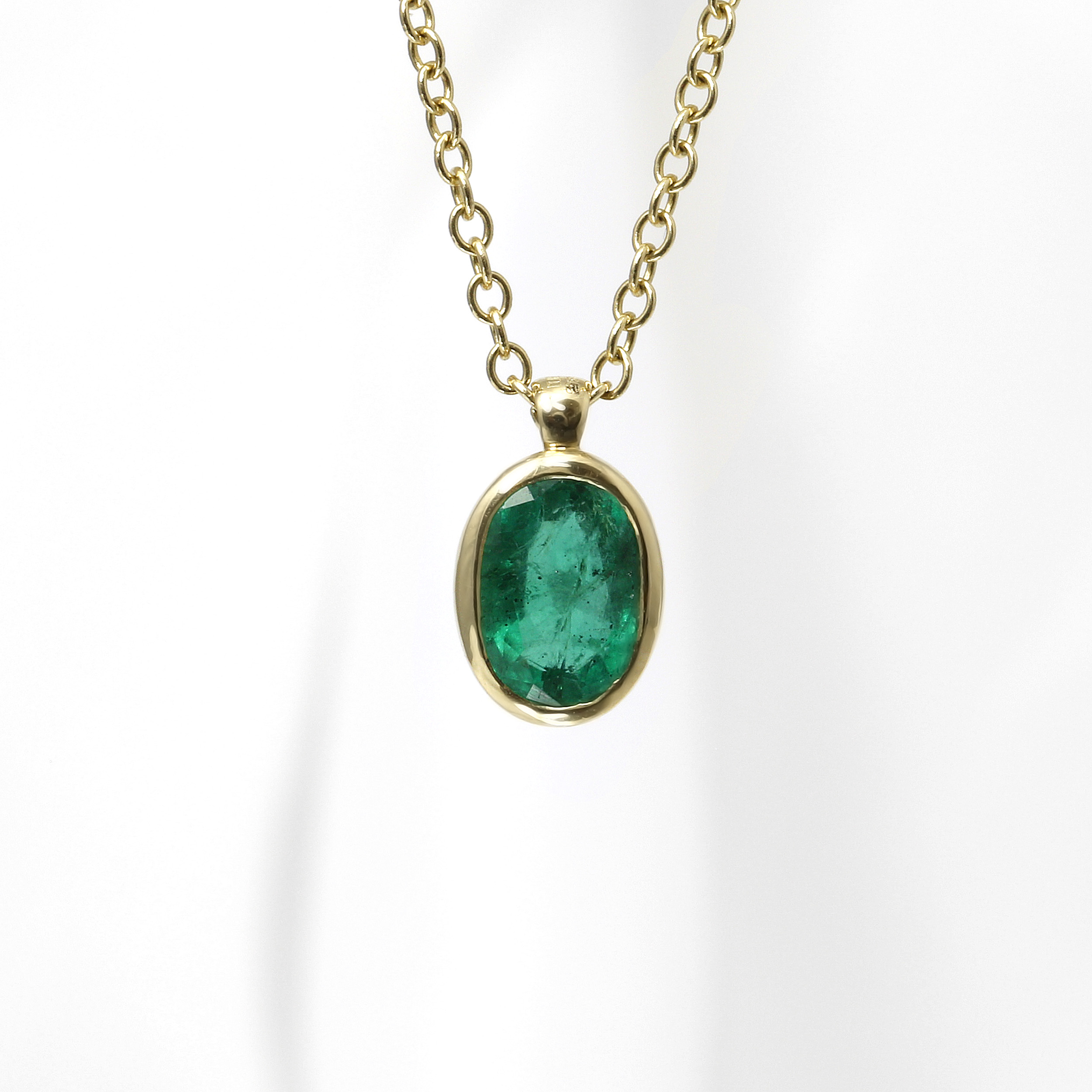 Oval Emerald Pendant in 9ct Yellow Gold