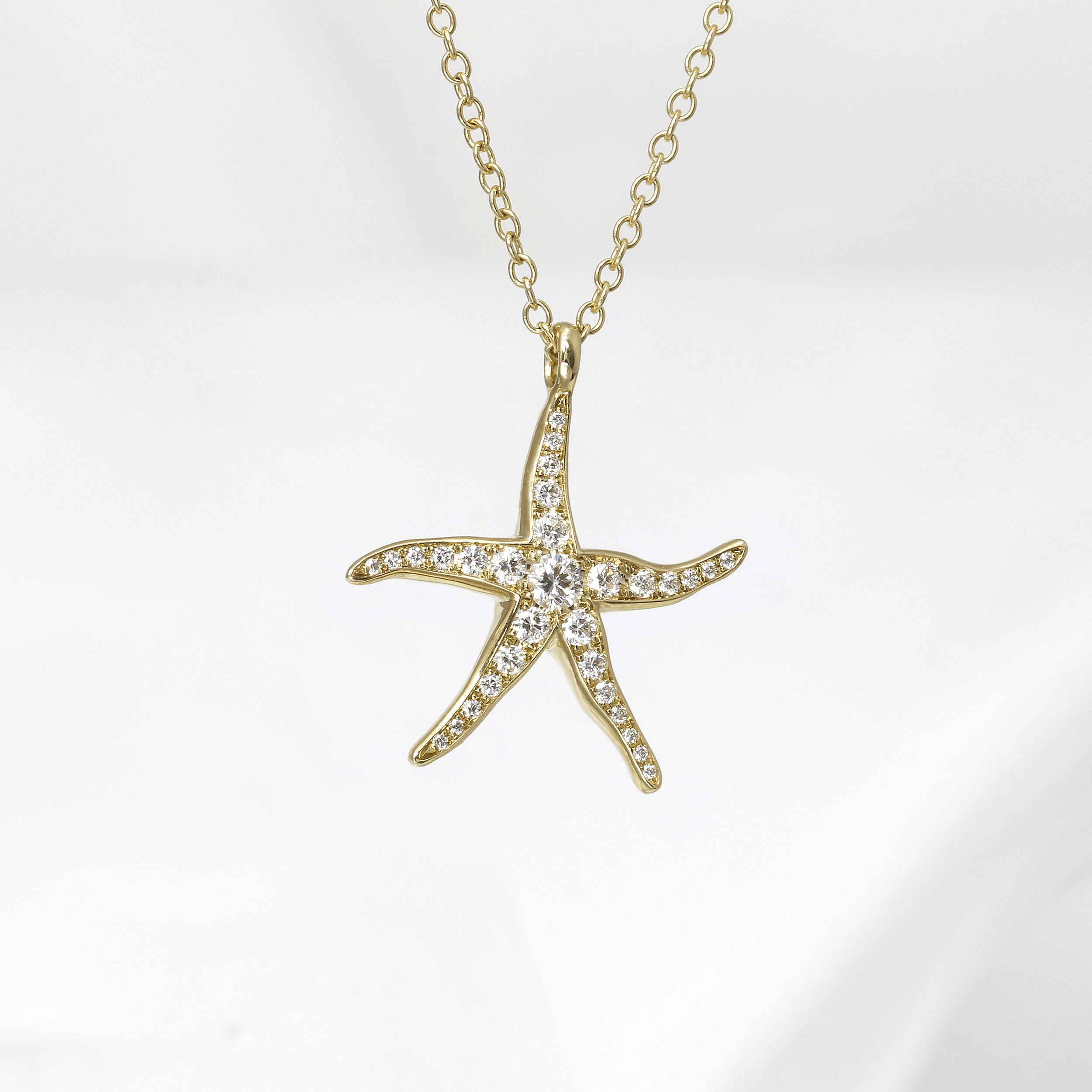 Medium Sized Diamond Starfish Pendant in Yellow Gold