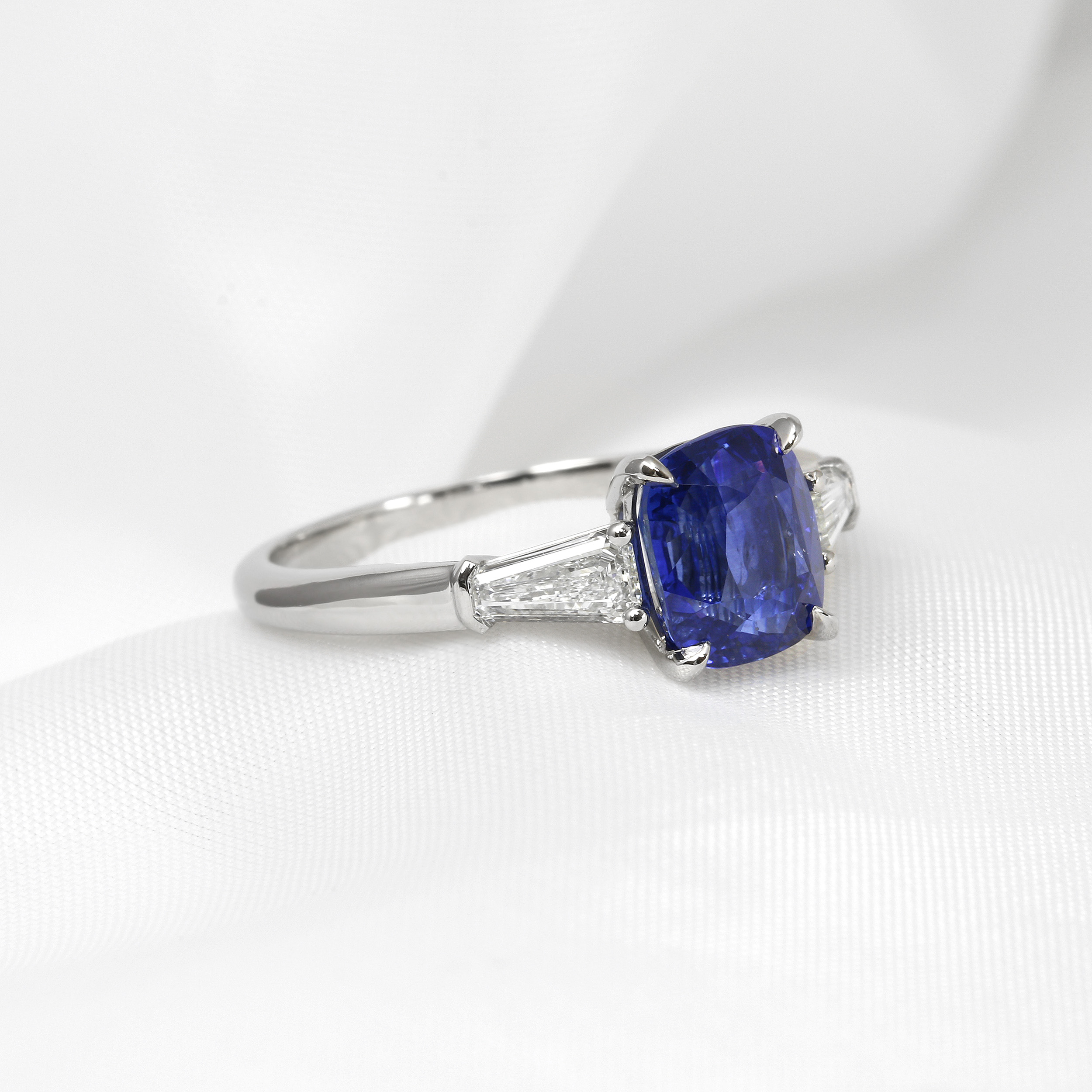 Cushion Sapphire and Tapered Baguette Diamond Ring in Platinum