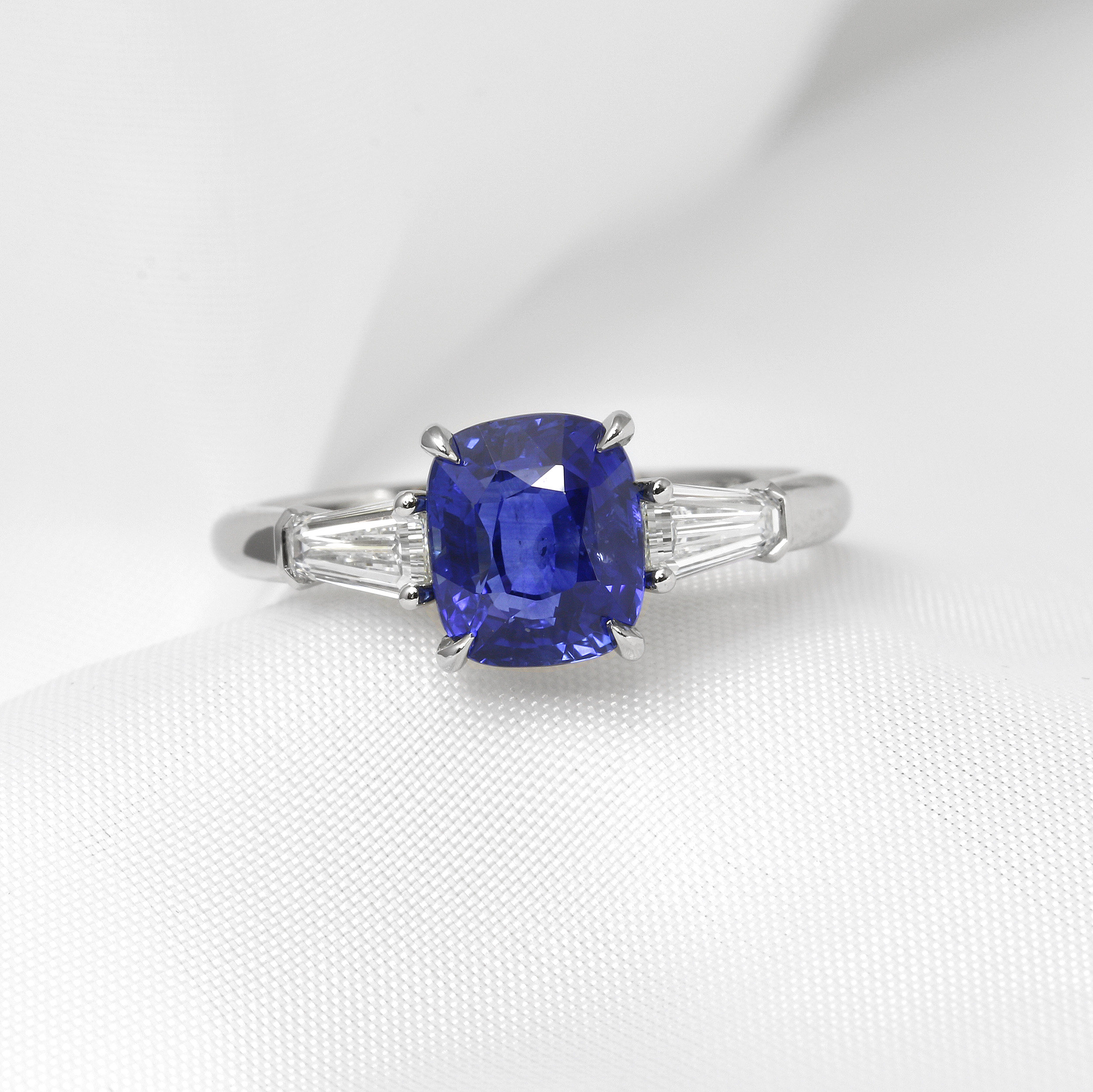 Cushion Sapphire and Tapered Baguette Diamond Ring in Platinum