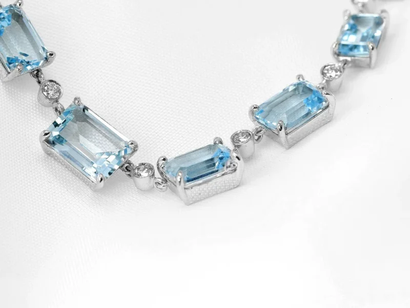 July 2022 - Blue Topaz and Diamond in White Gold