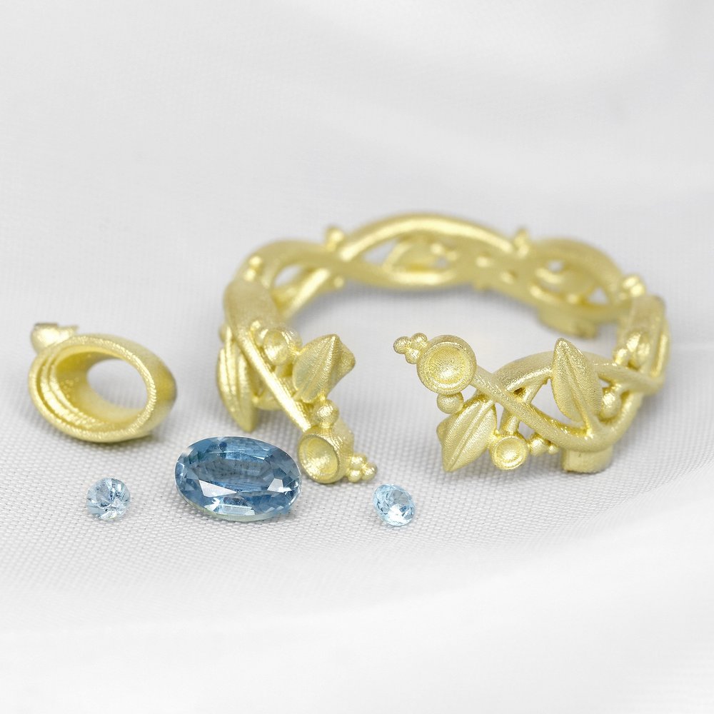 May 2023 - Aquamarine and Diamond in Yellow Gold with Hand Engraved Leaves
