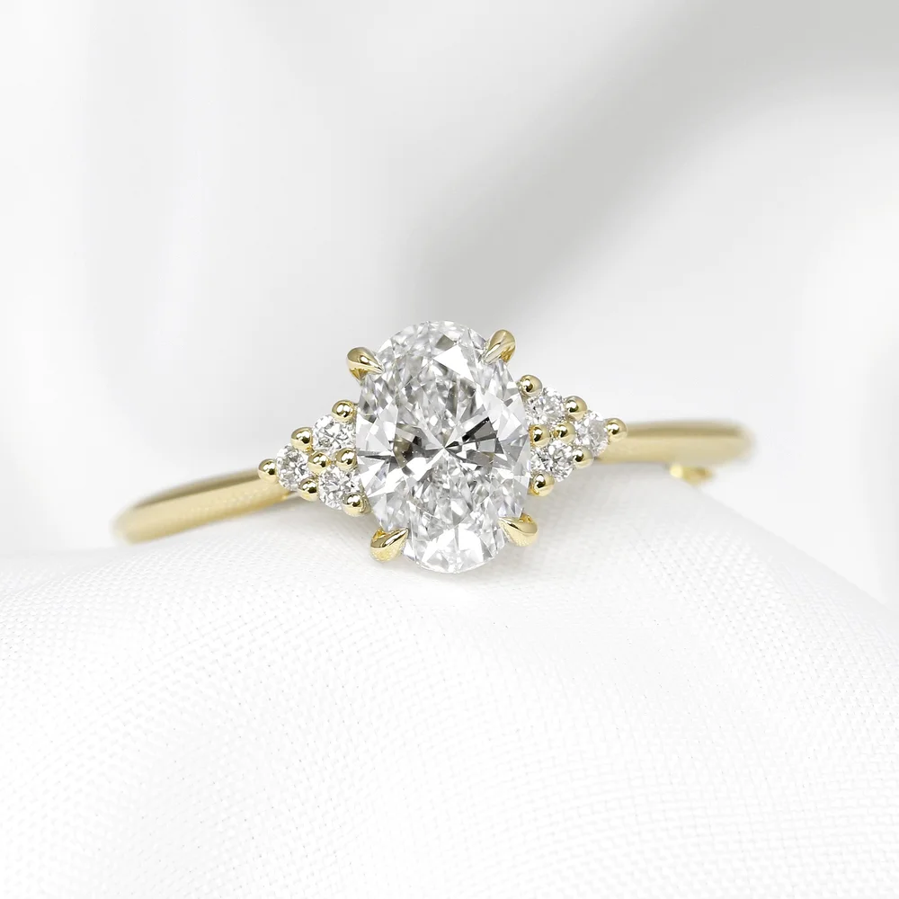 May 2023 - Lab-Created Oval Diamond with Natural Diamonds in Yellow Gold