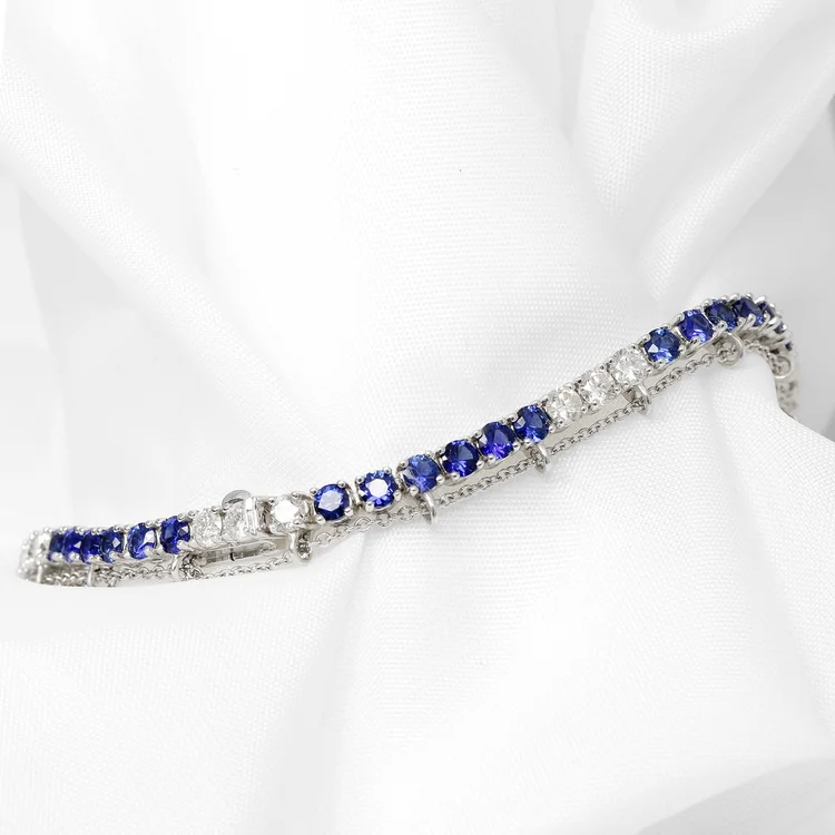May 2024 - Sapphire and Diamond in White Gold