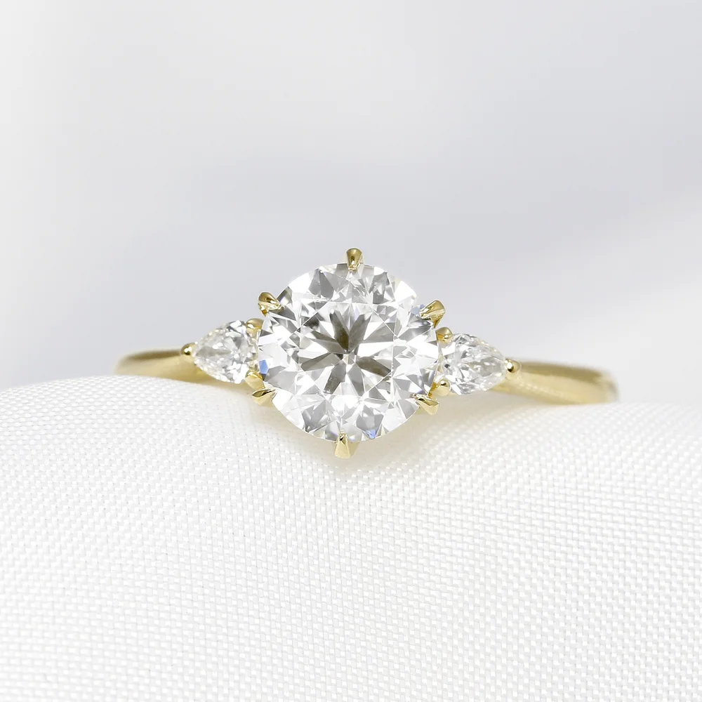 November 2022 - Round and Pear Diamonds in Yellow Gold