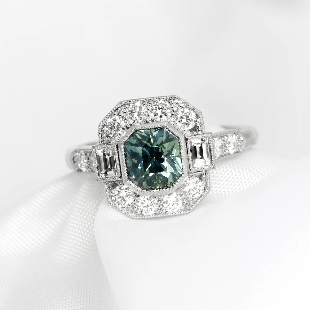 November 2022 - Teal Sapphire and Diamonds in Platinum