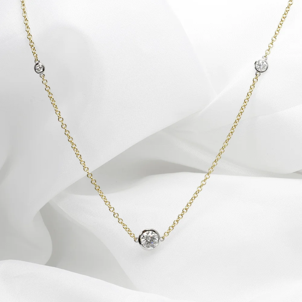 November 2023 - 2.96ct Round Diamonds in Platinum & Yellow Gold