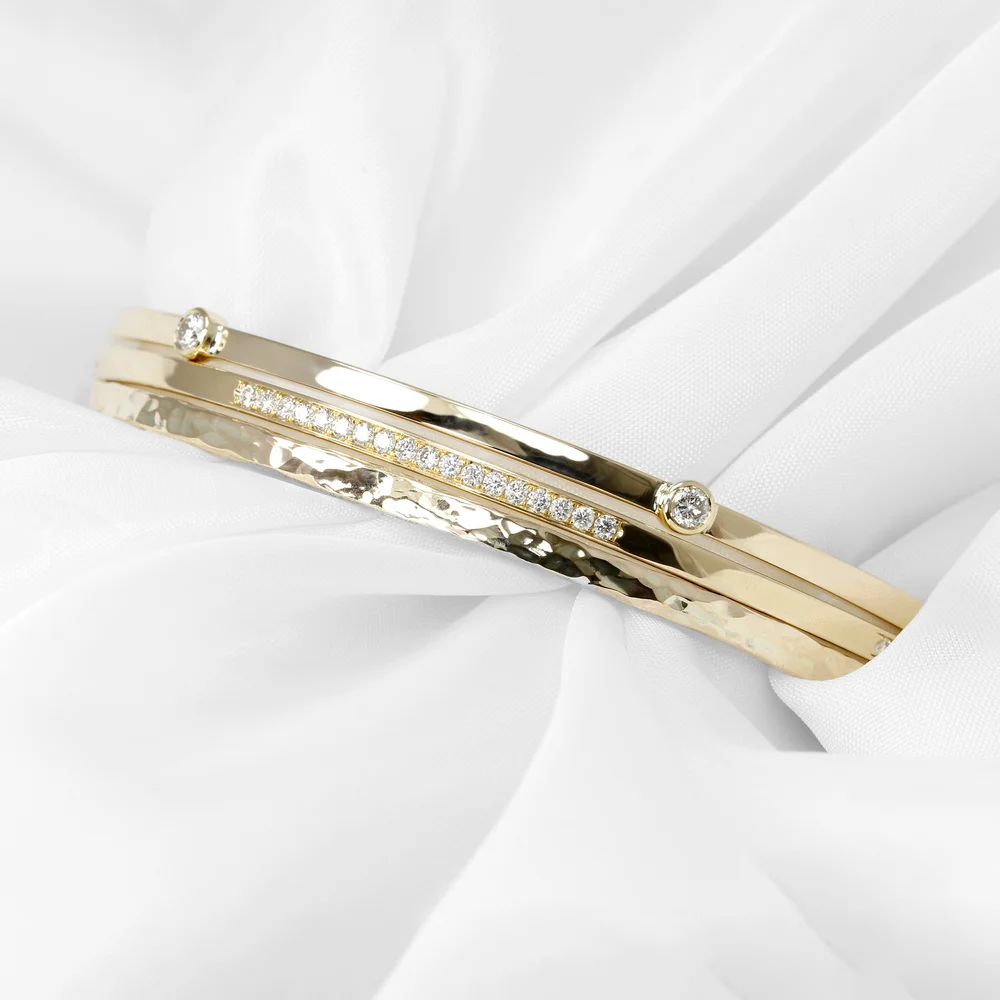 November 2023 - Trio of Bangles with Round Diamonds in Yellow Gold