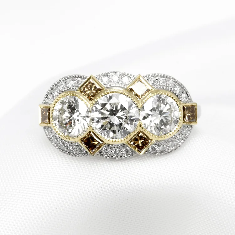 October 2024 - Round Brilliant Diamonds with Princess Cut Brown Diamonds in Yellow Gold & Platinum