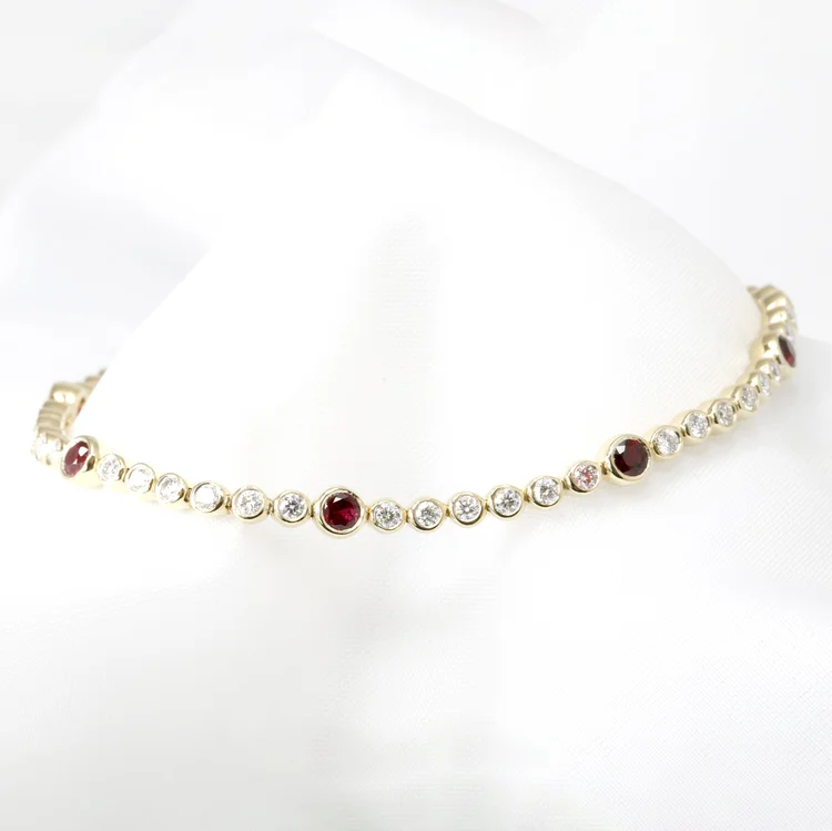Ruby and Diamond Line Bracelet in Yellow Gold