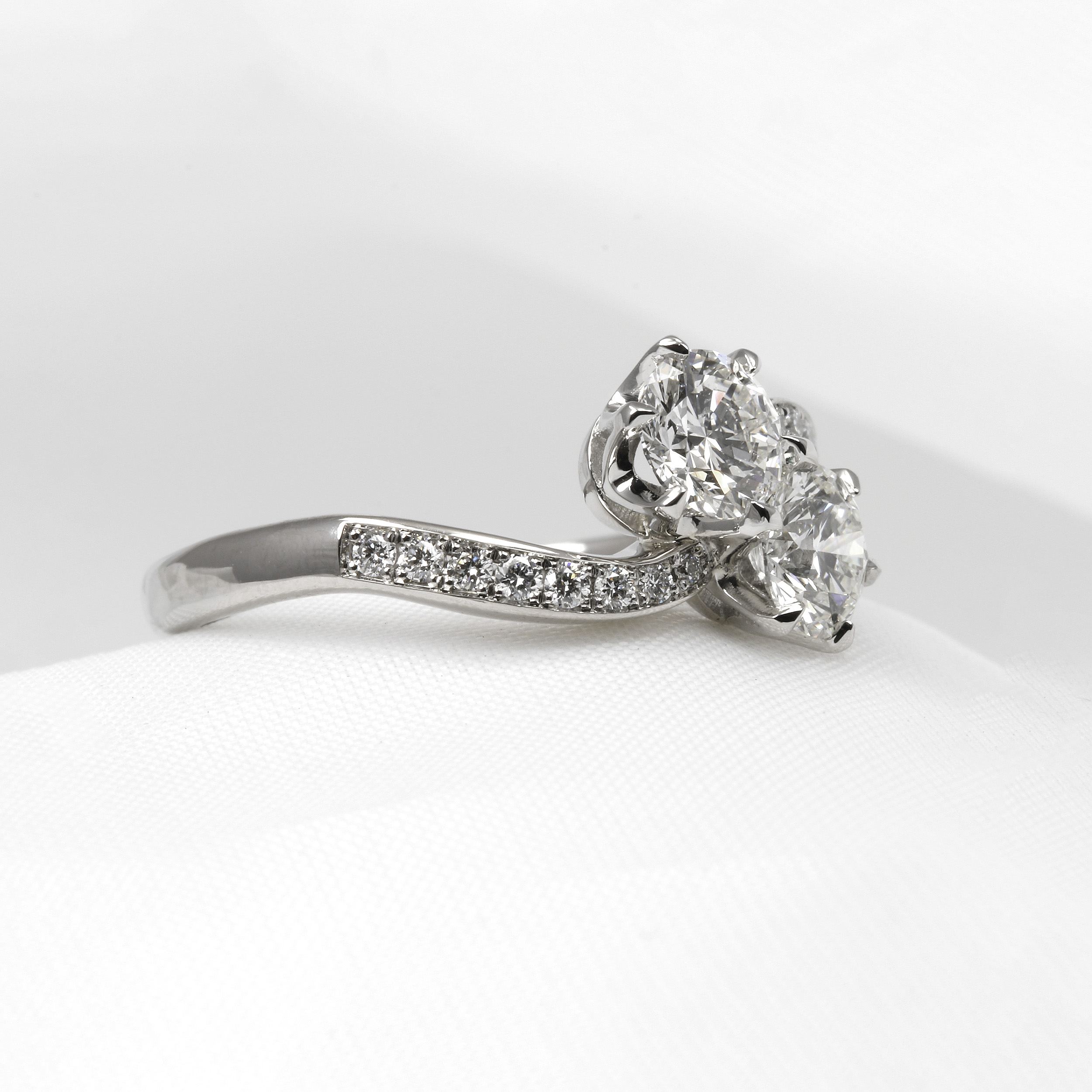 Two Stone Cross Over Ring in Platinum
