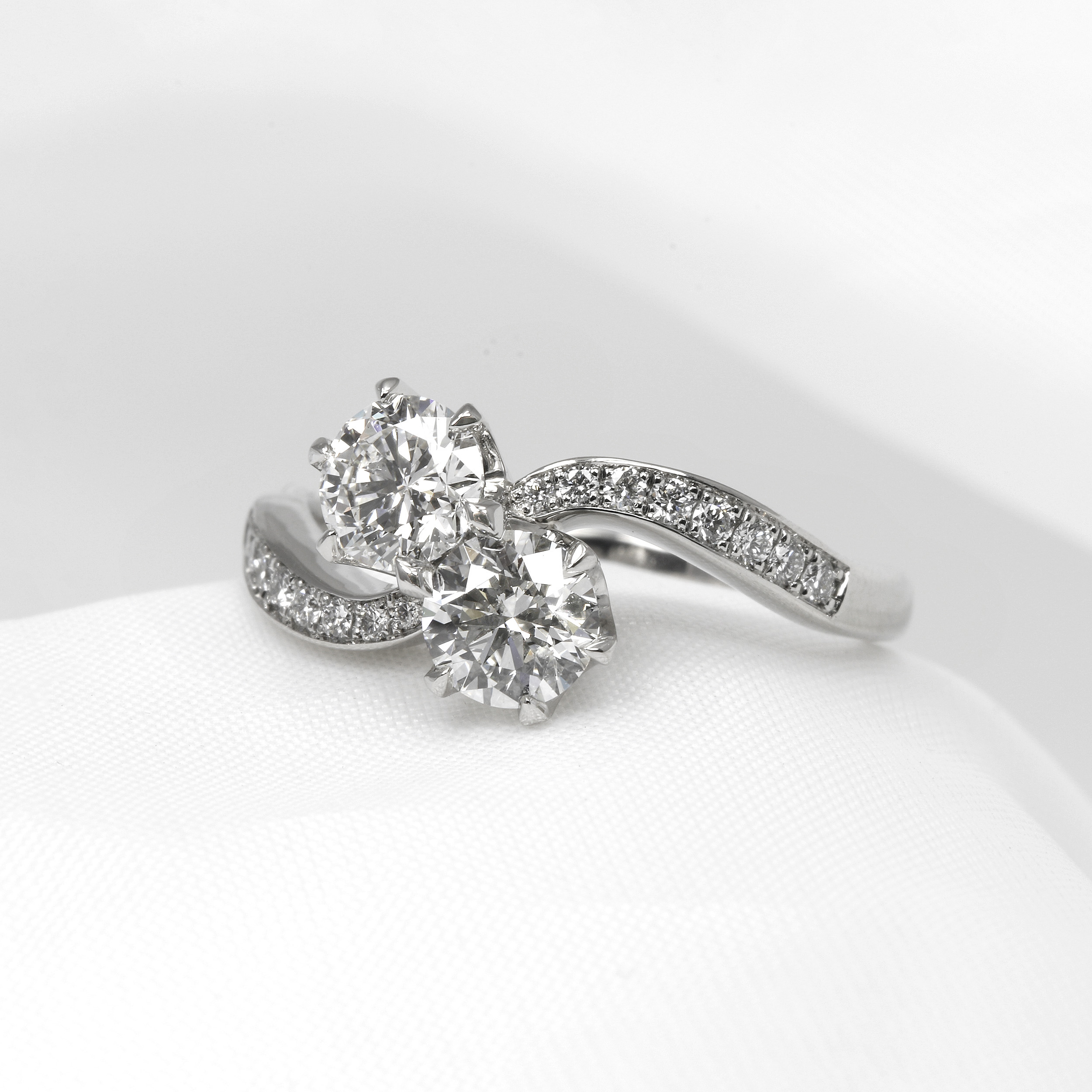 Two Stone Cross Over Ring in Platinum