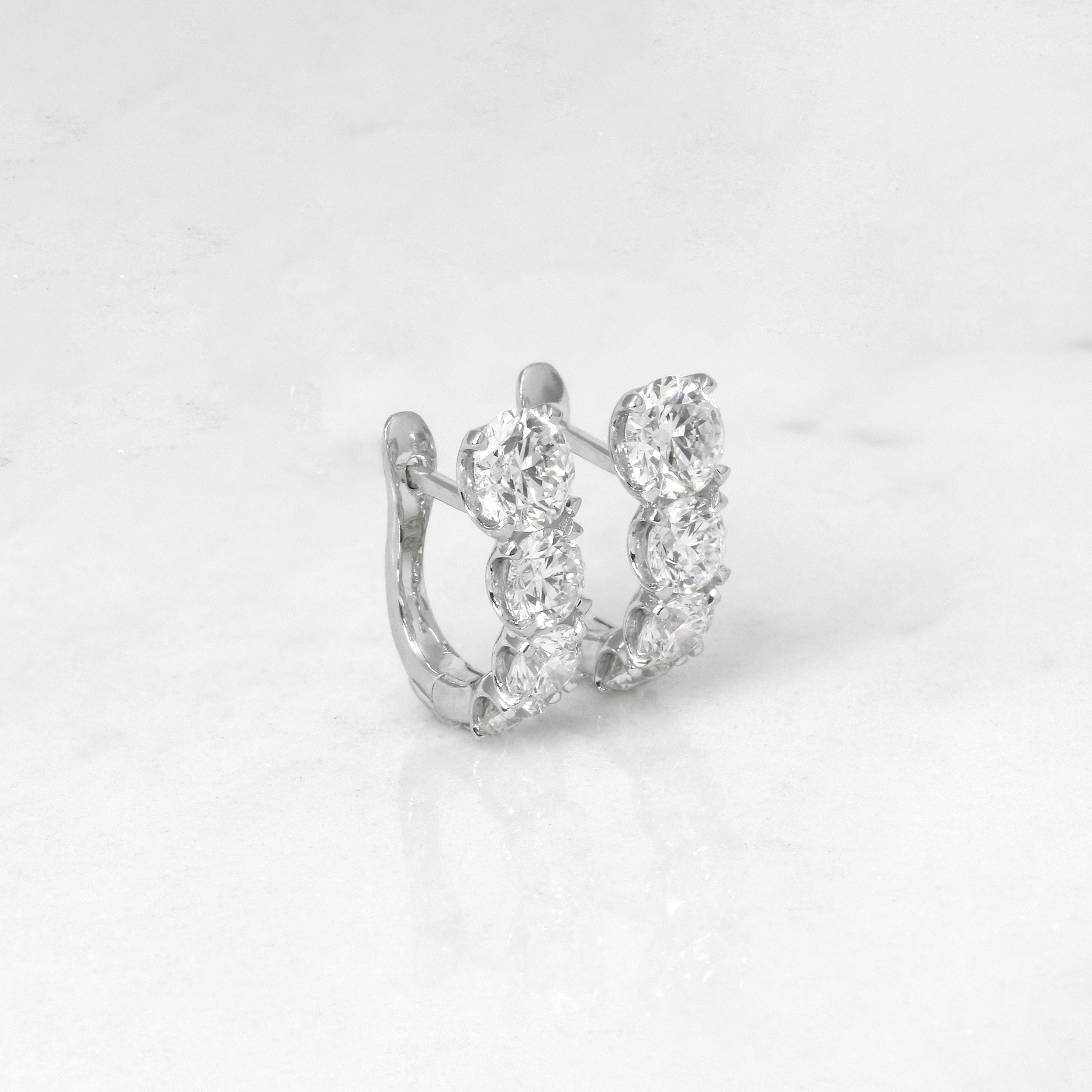 Graduated Diamond Half Hoop Earrings in 18ct White Gold