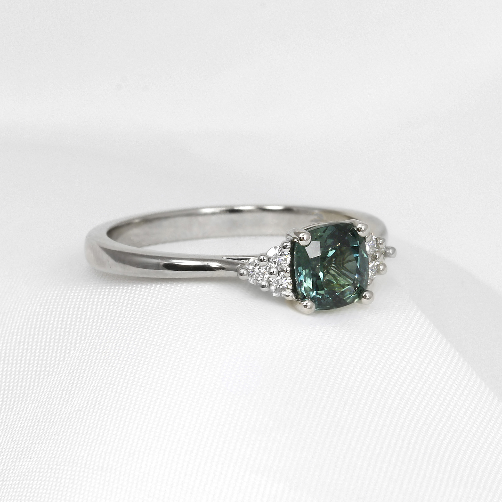 Teal Sapphire and Diamond Trefoil Ring in Platinum