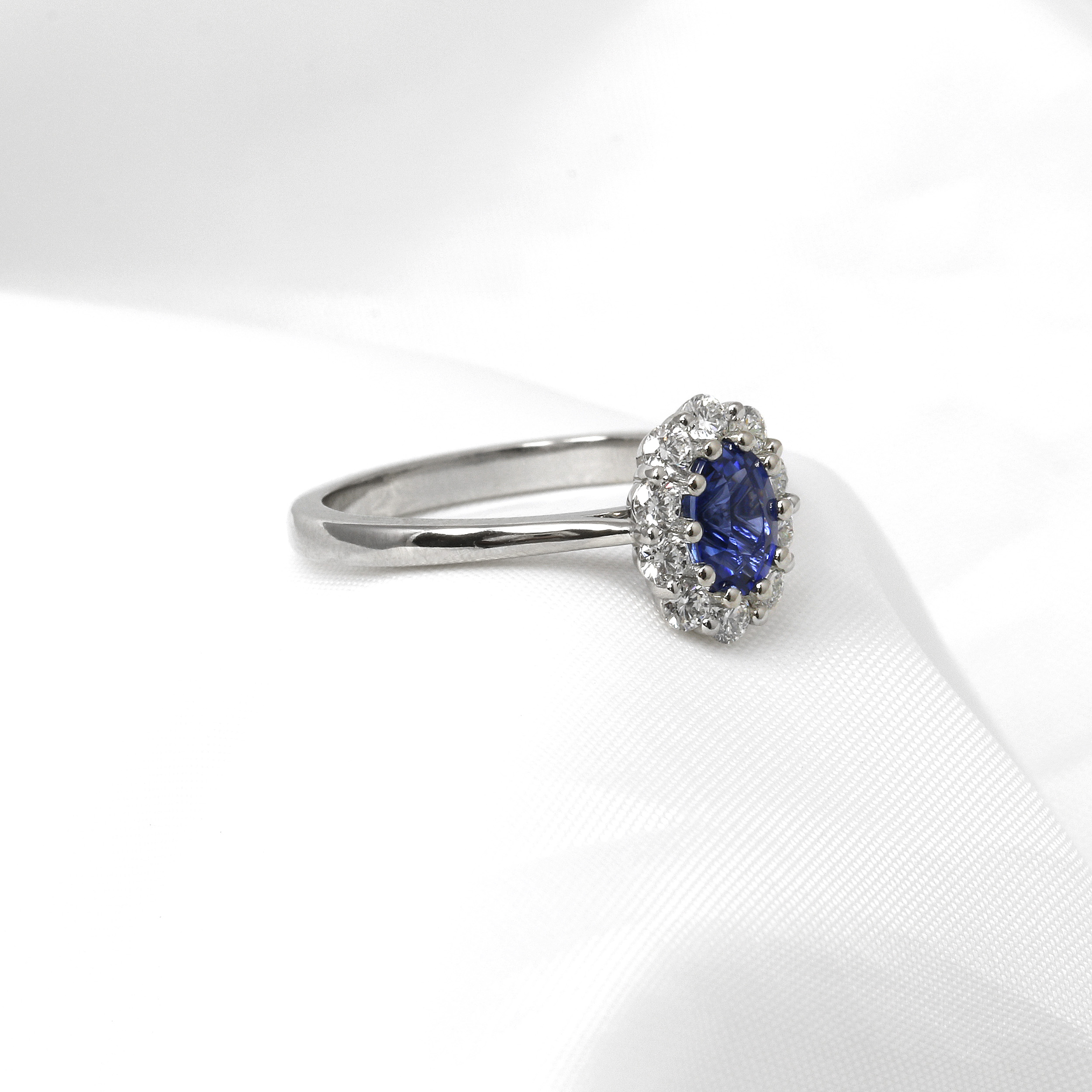 Sapphire and Diamond Oval Cluster Ring in Platinum