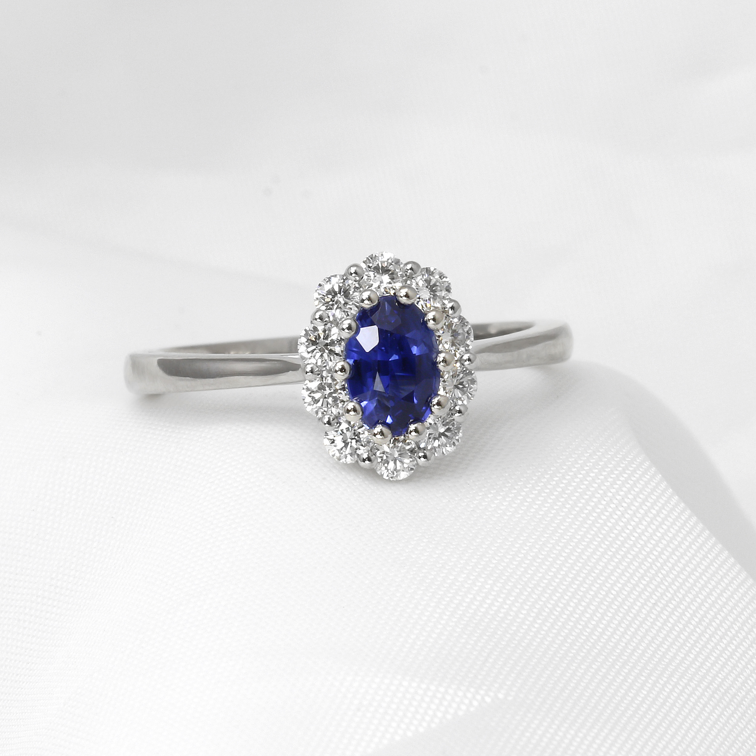 Sapphire and Diamond Oval Cluster Ring in Platinum