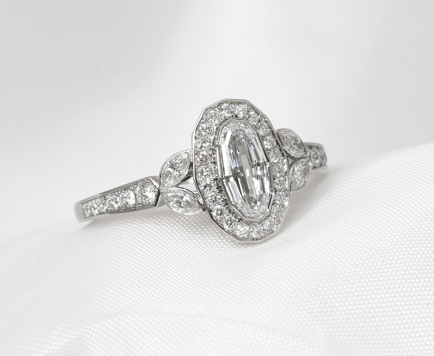 Oval Cluster Diamond Ring in Platinum