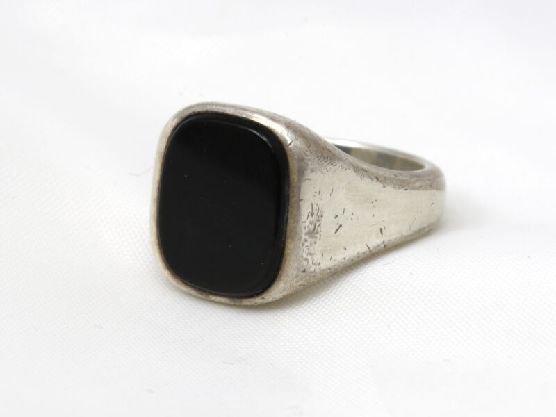Silver and onyx ring damaged by bleach