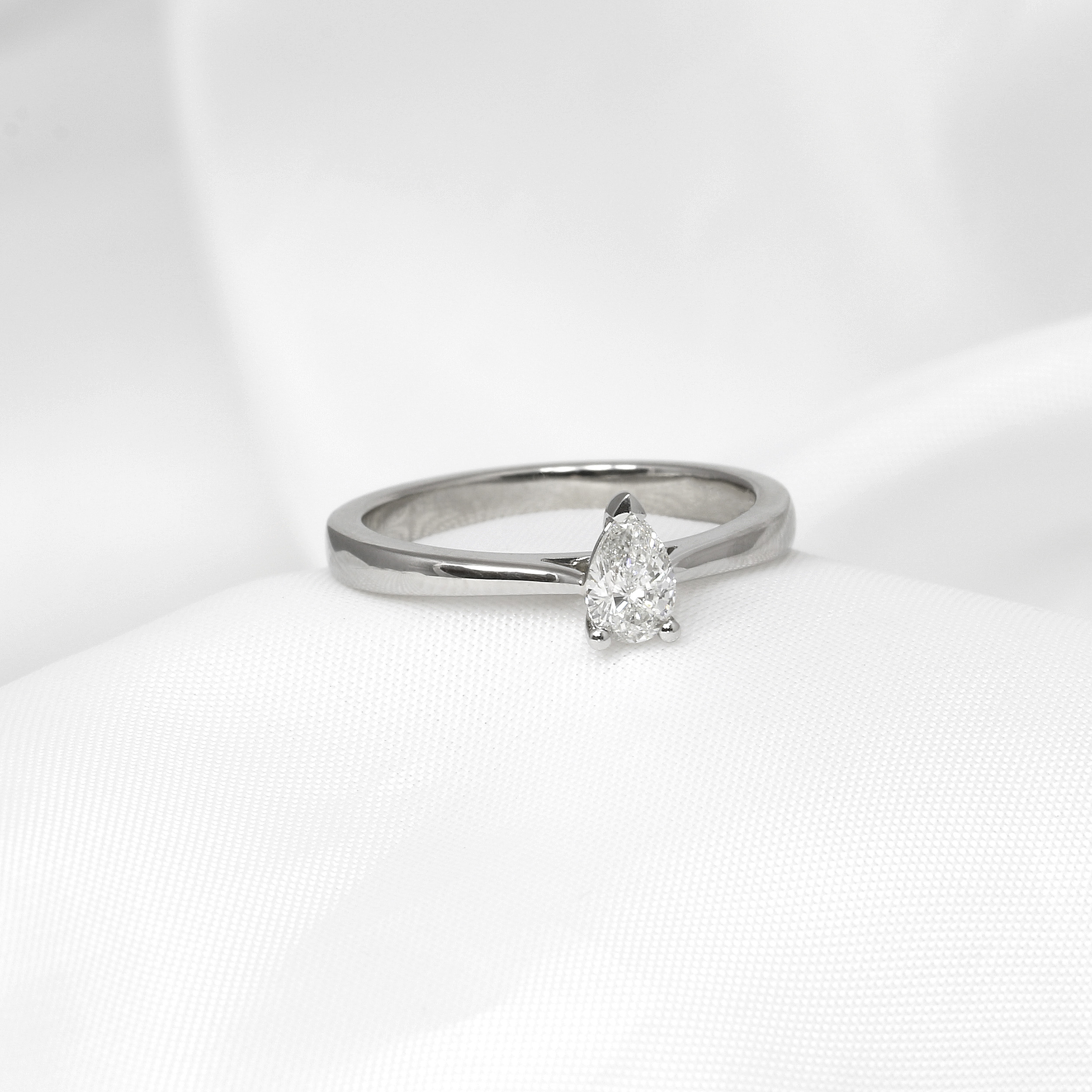 Diamond Pear Shape Solitaire Ring in platinum.