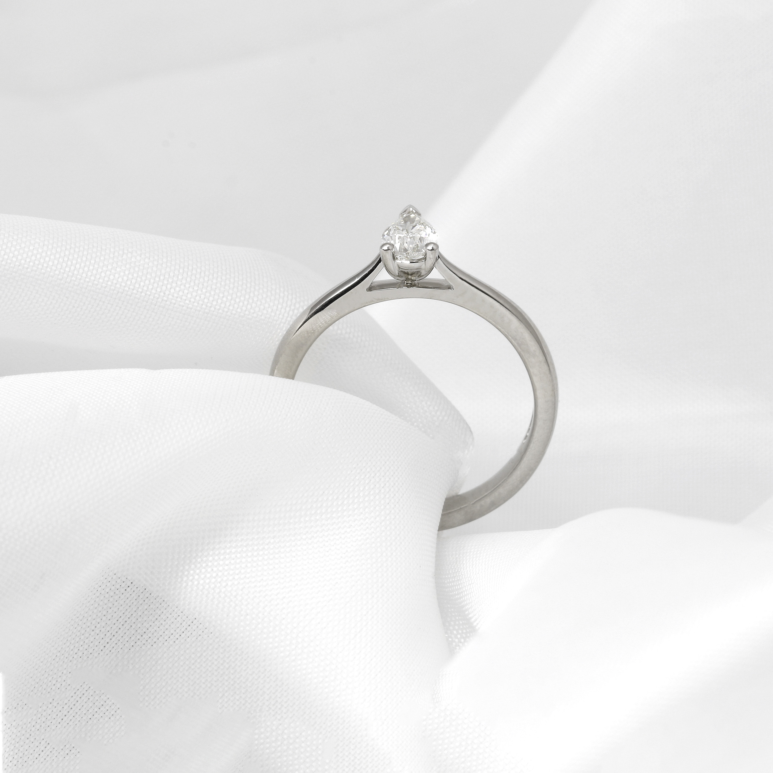 Diamond Pear Shape Solitaire Ring in platinum.