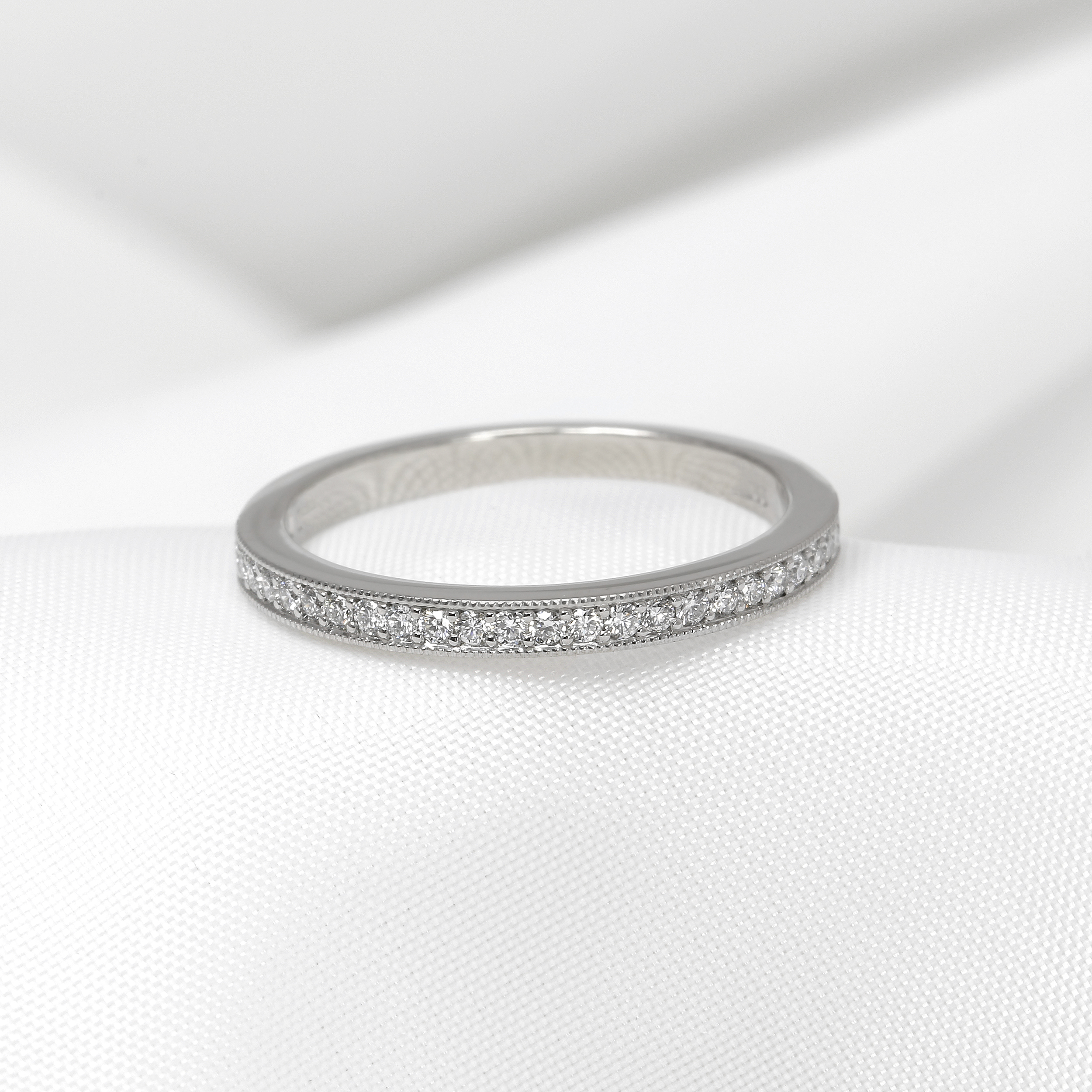 Grain Set Diamond Half Eternity Ring in Platinum