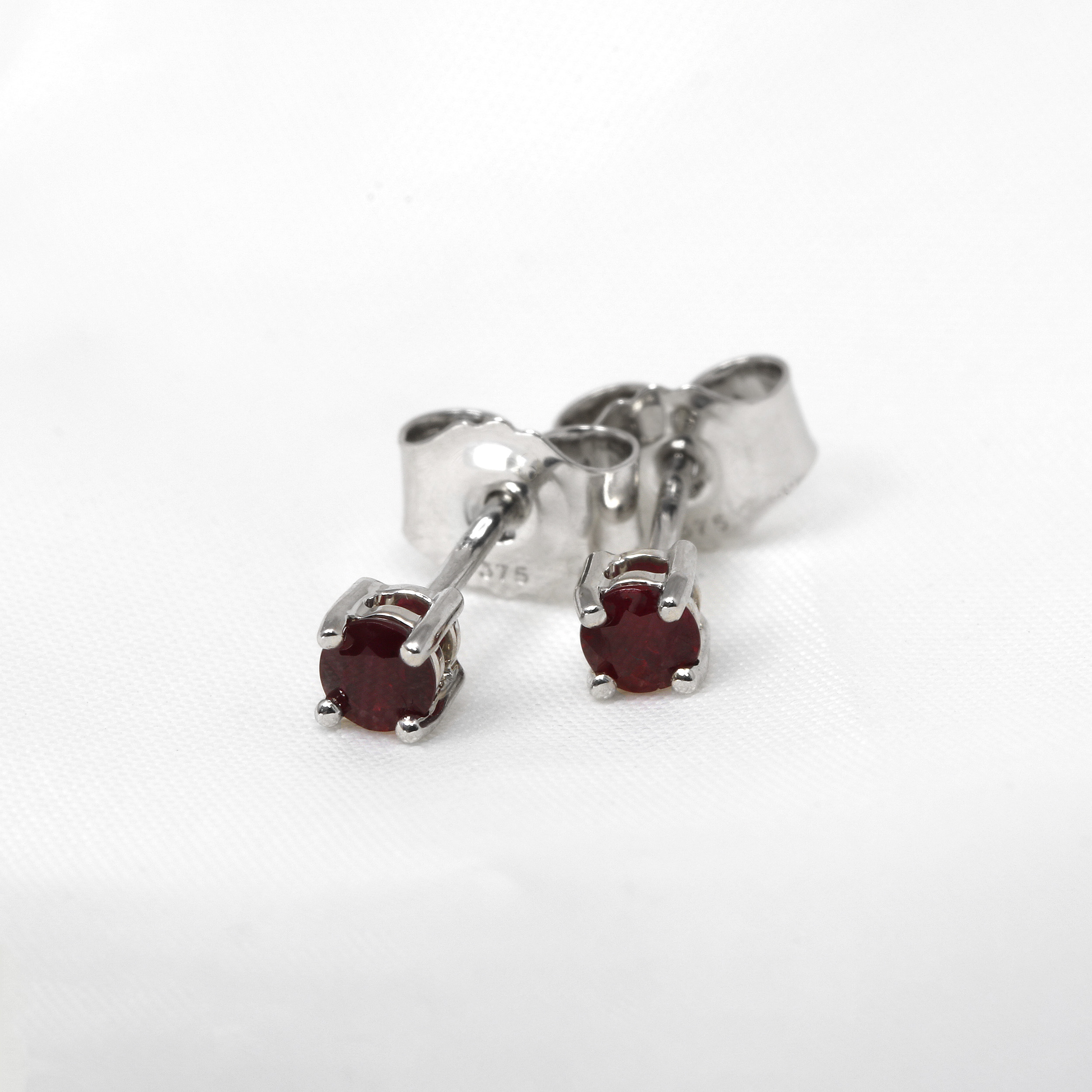 0.36ct Ruby Stud Earrings in 9ct White Gold