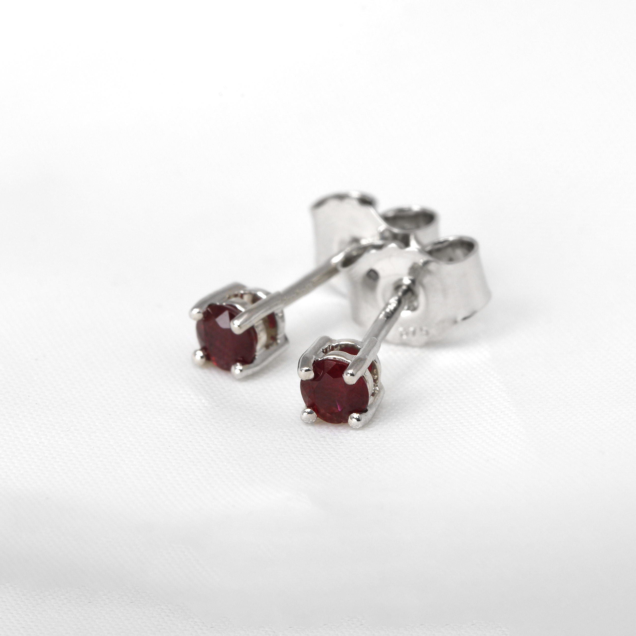 0.36ct Ruby Stud Earrings in 9ct White Gold