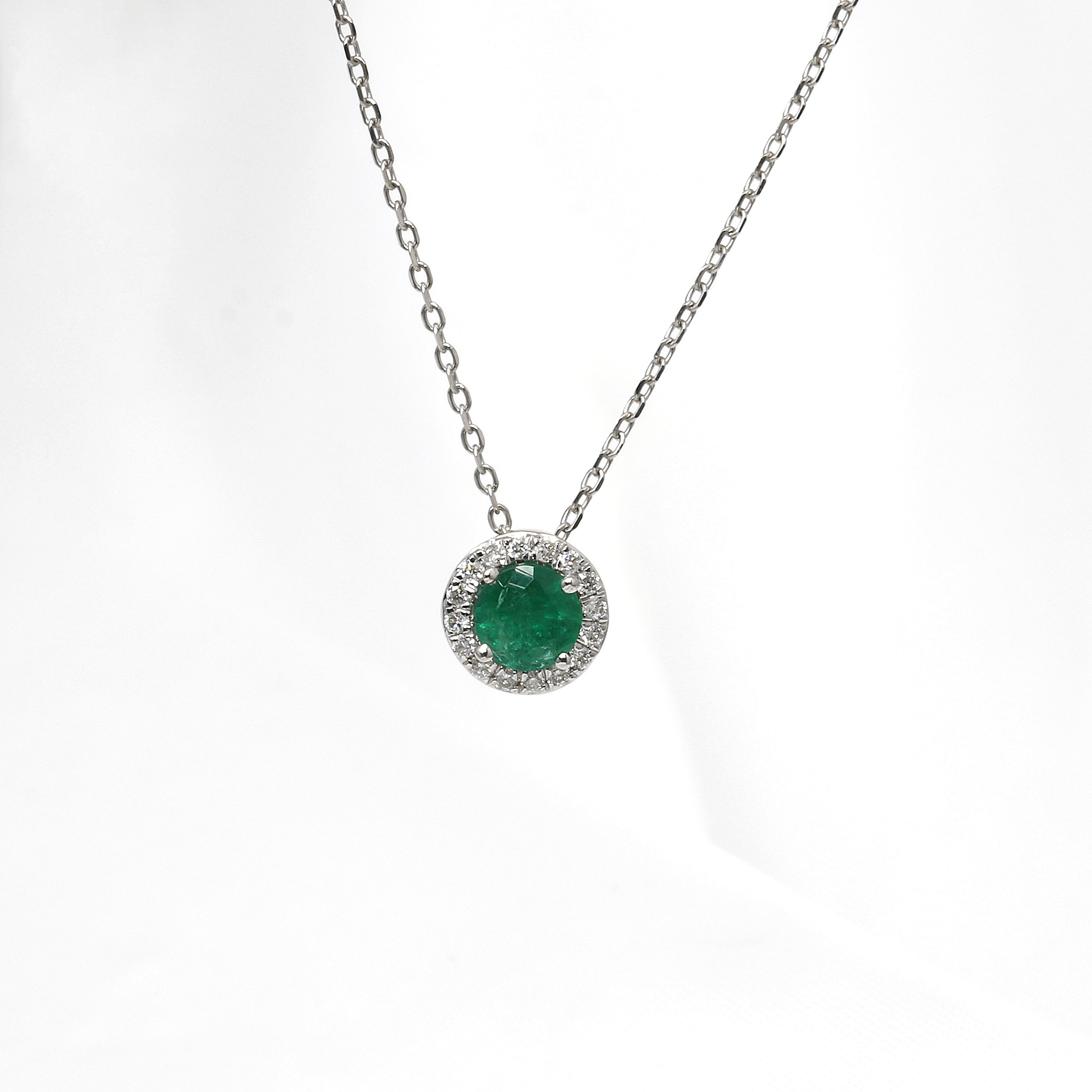 Emerald and Diamond Halo Cluster Pendant in 18ct White Gold
