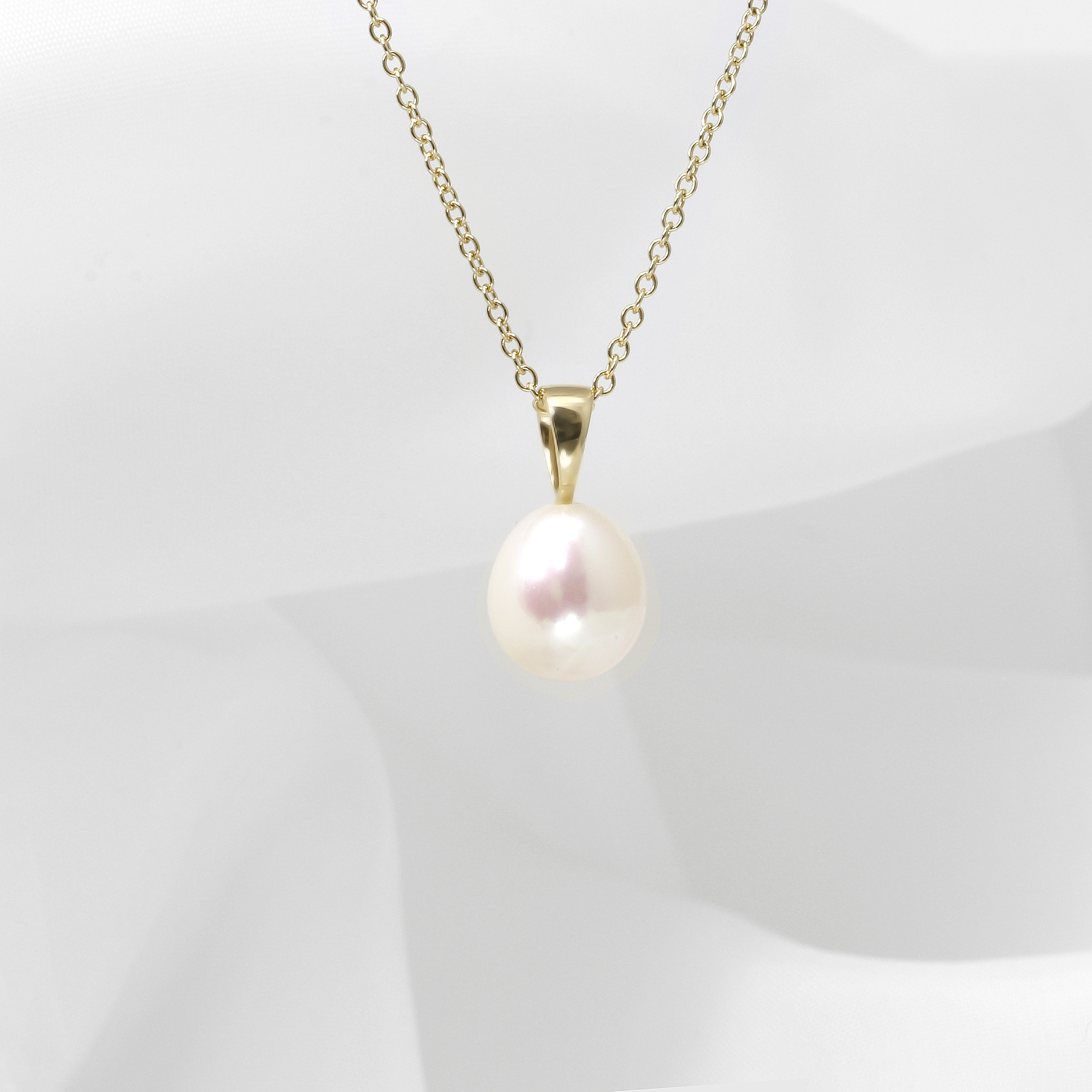 White Teardrop Cultured Freshwater Pearl Pendant in Yellow Gold