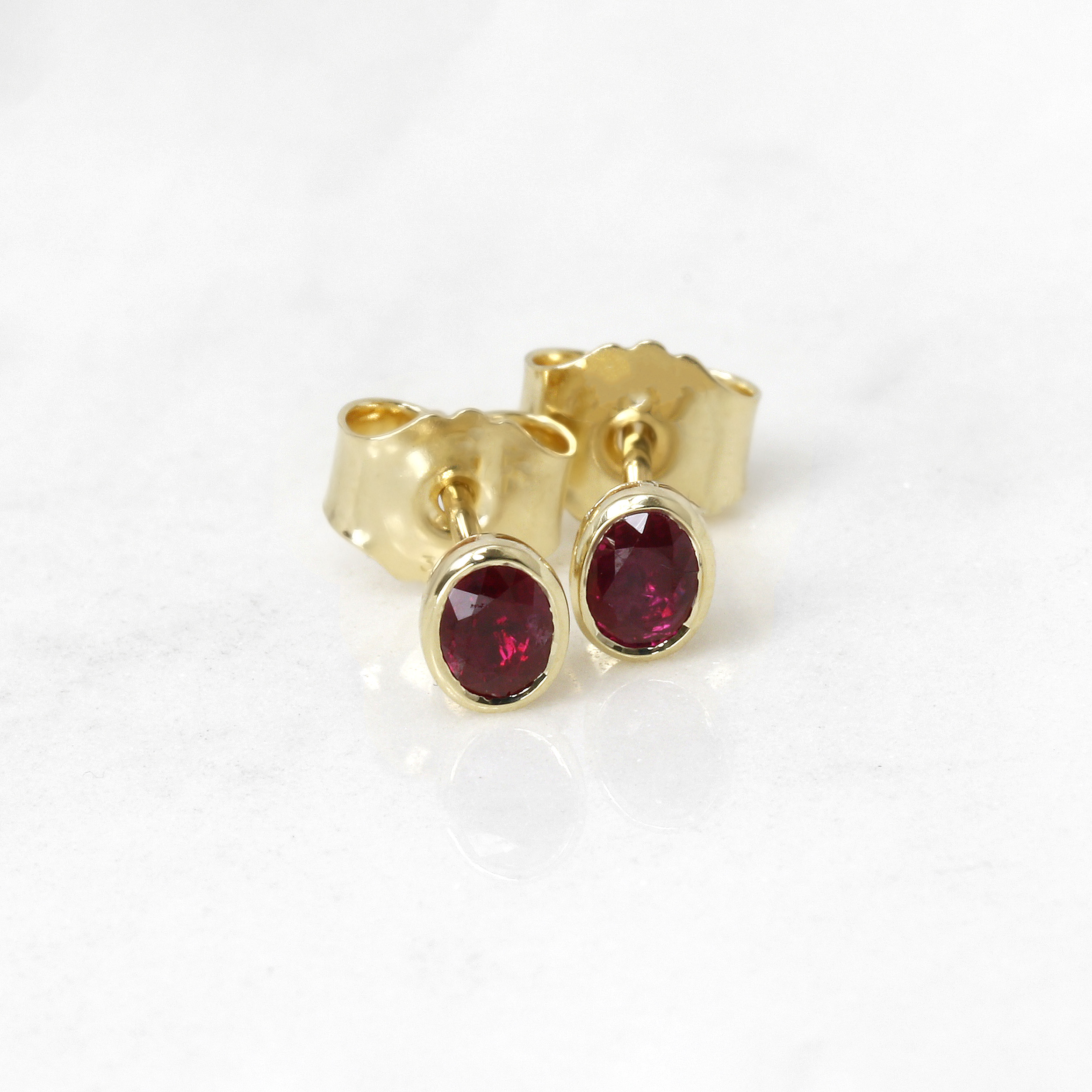Oval Ruby Stud Earrings in 9ct Yellow Gold