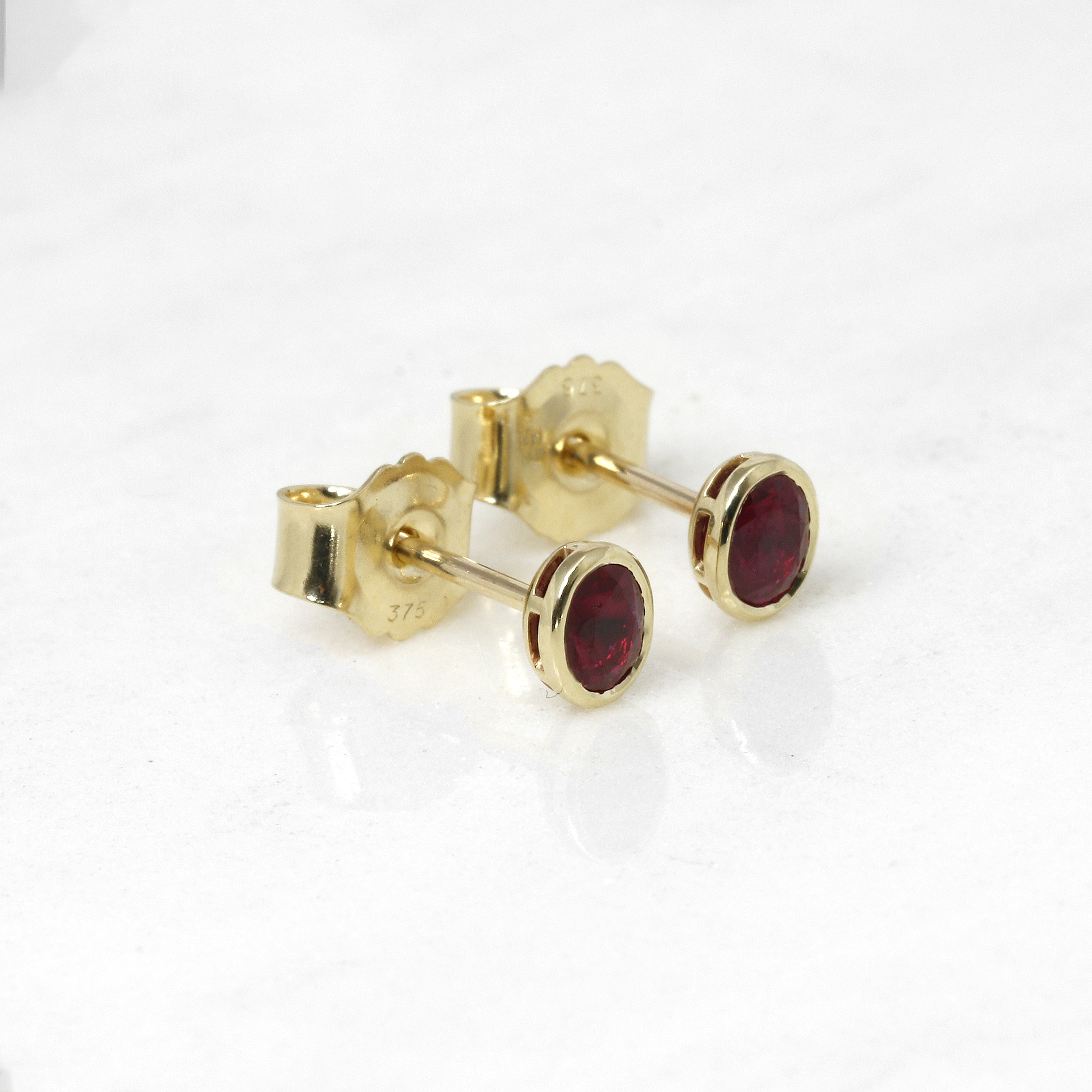 Oval Ruby Stud Earrings in 9ct Yellow Gold