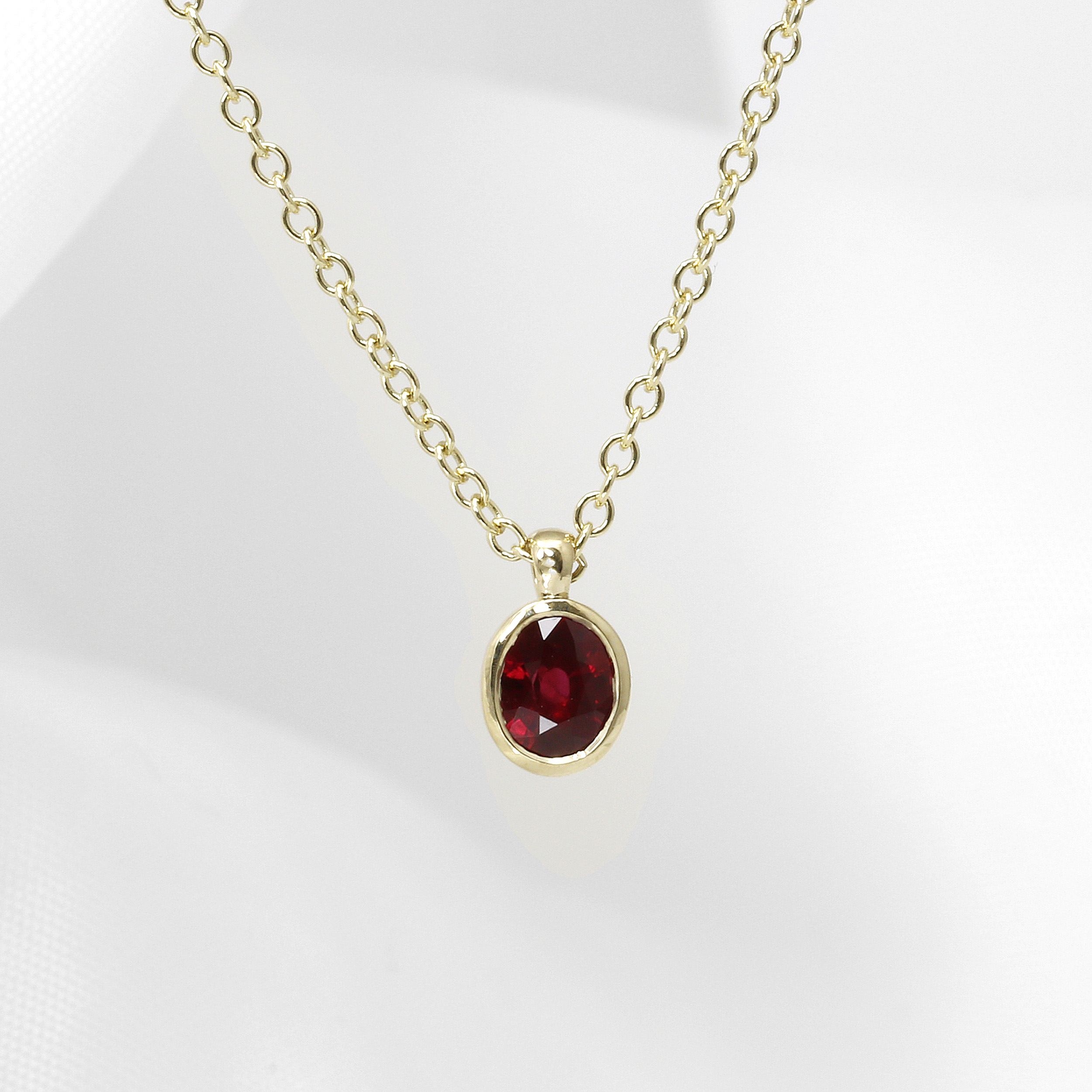 Oval Ruby Pendant in 9ct Yellow Gold