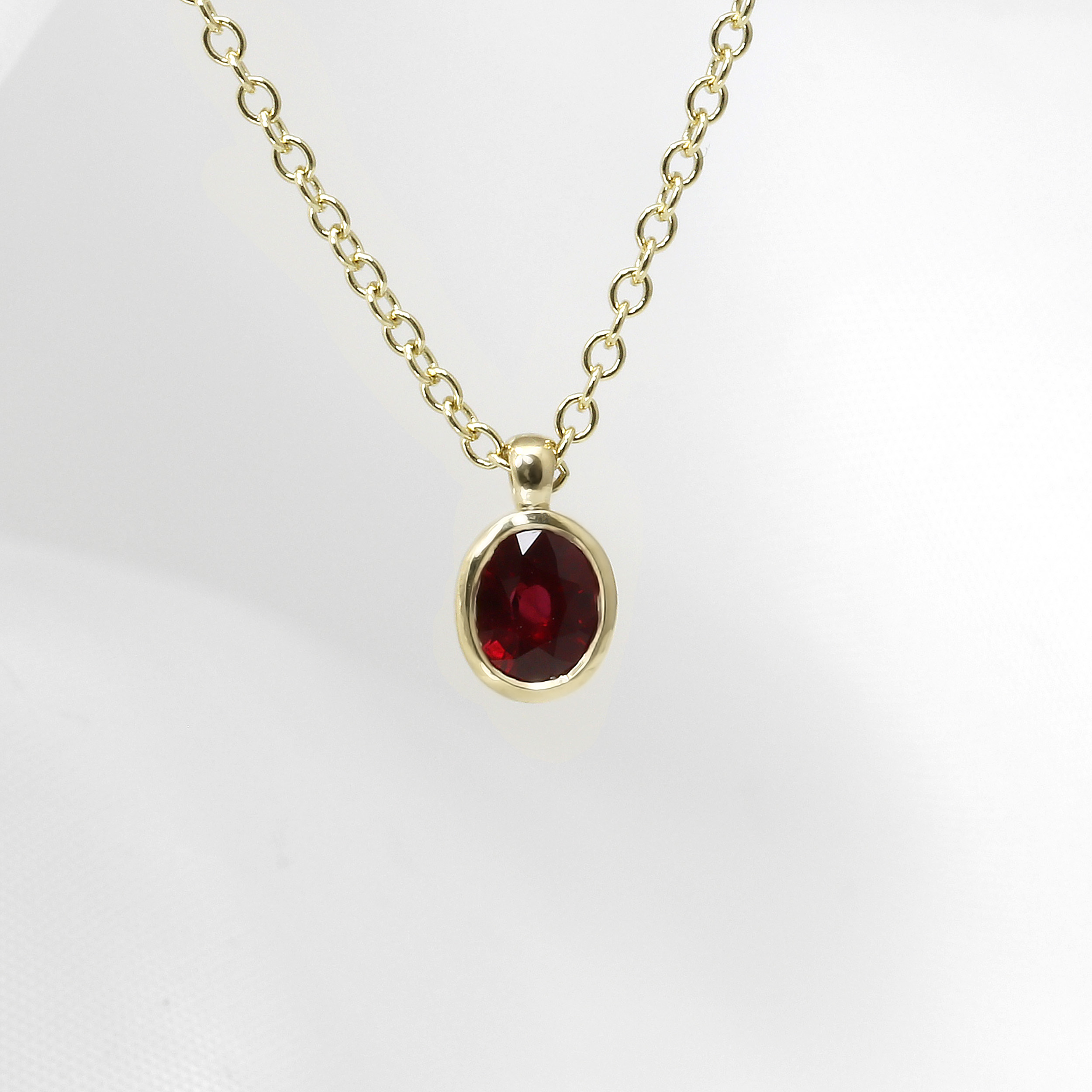 Oval Ruby Pendant in 9ct Yellow Gold