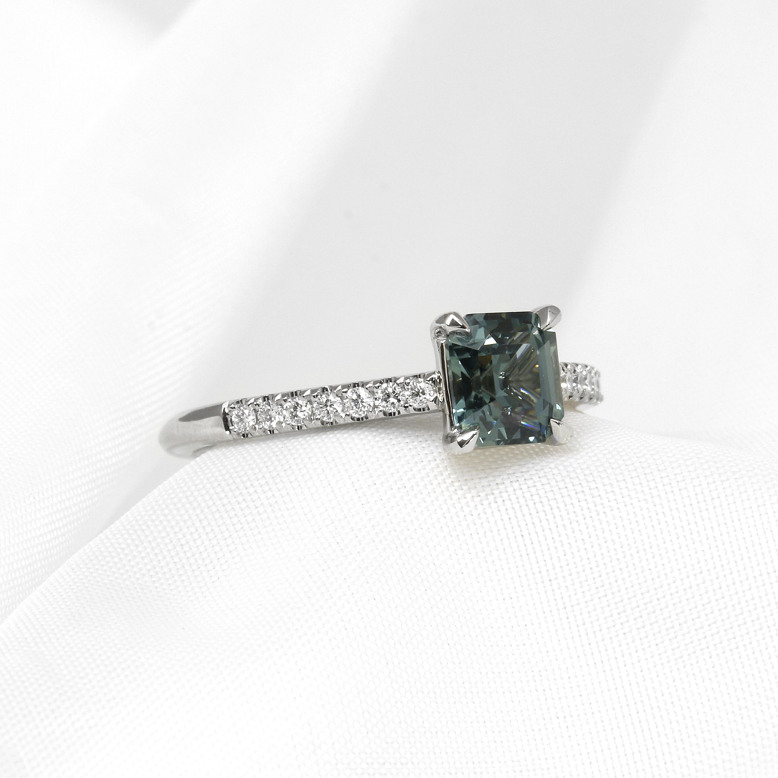 Teal Sapphire with Stone Set Shoulders in Platinum