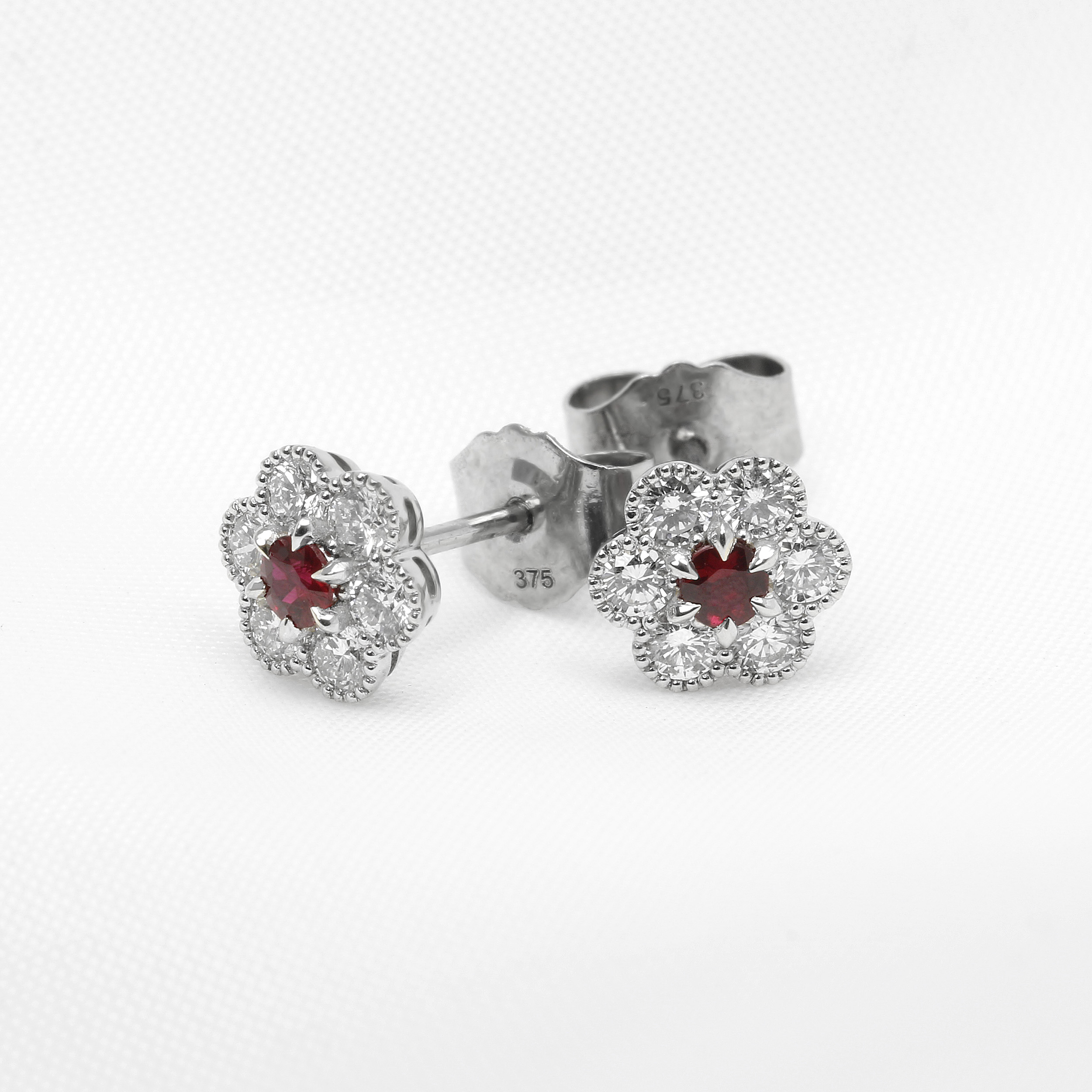 Daisy Cluster Ruby and Diamond Stud Earrings in 9ct White Gold