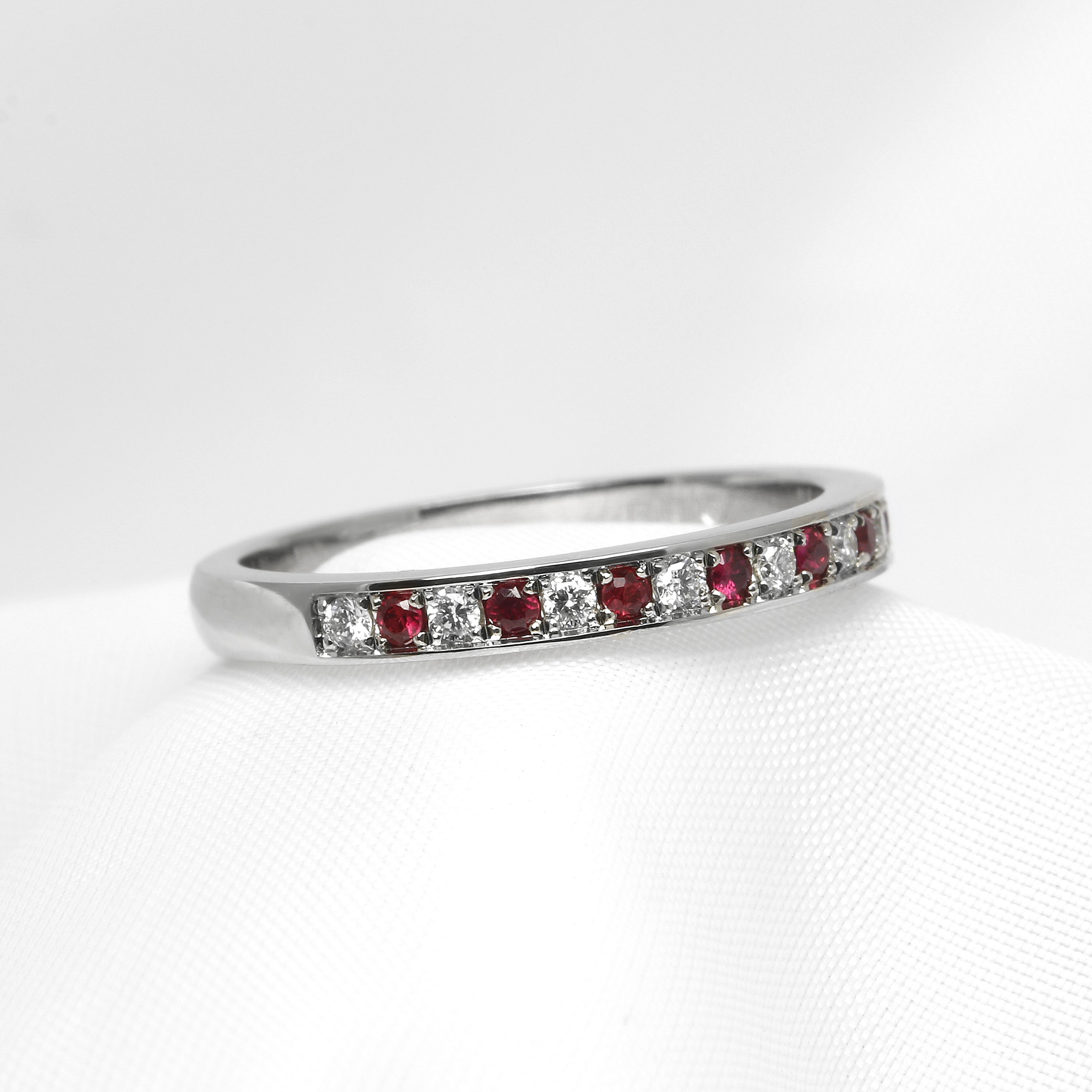 Grain Set Ruby and Diamond Half Eternity Ring in Platinum