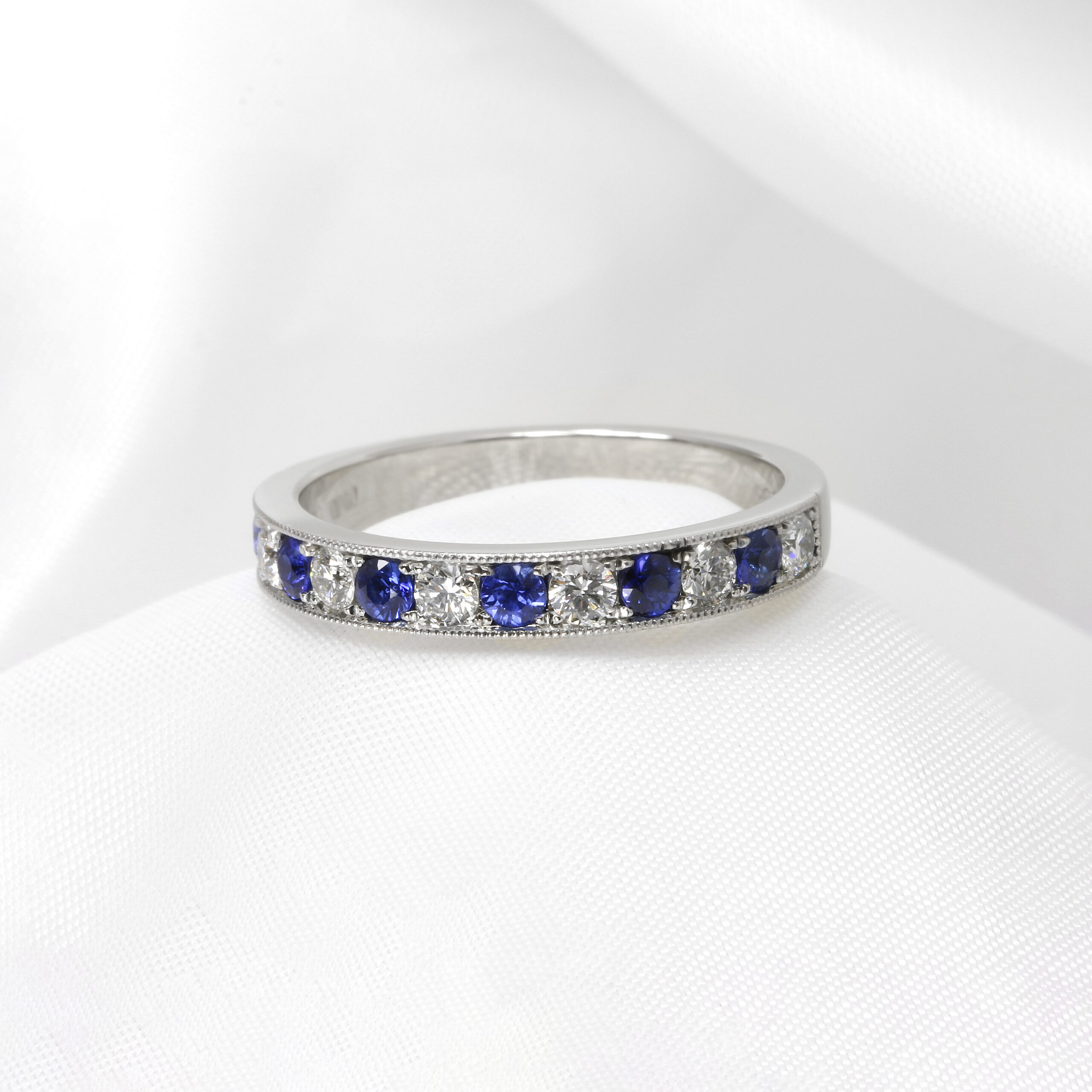 Grain Set Sapphire and Diamond Eternity Ring in Platinum
