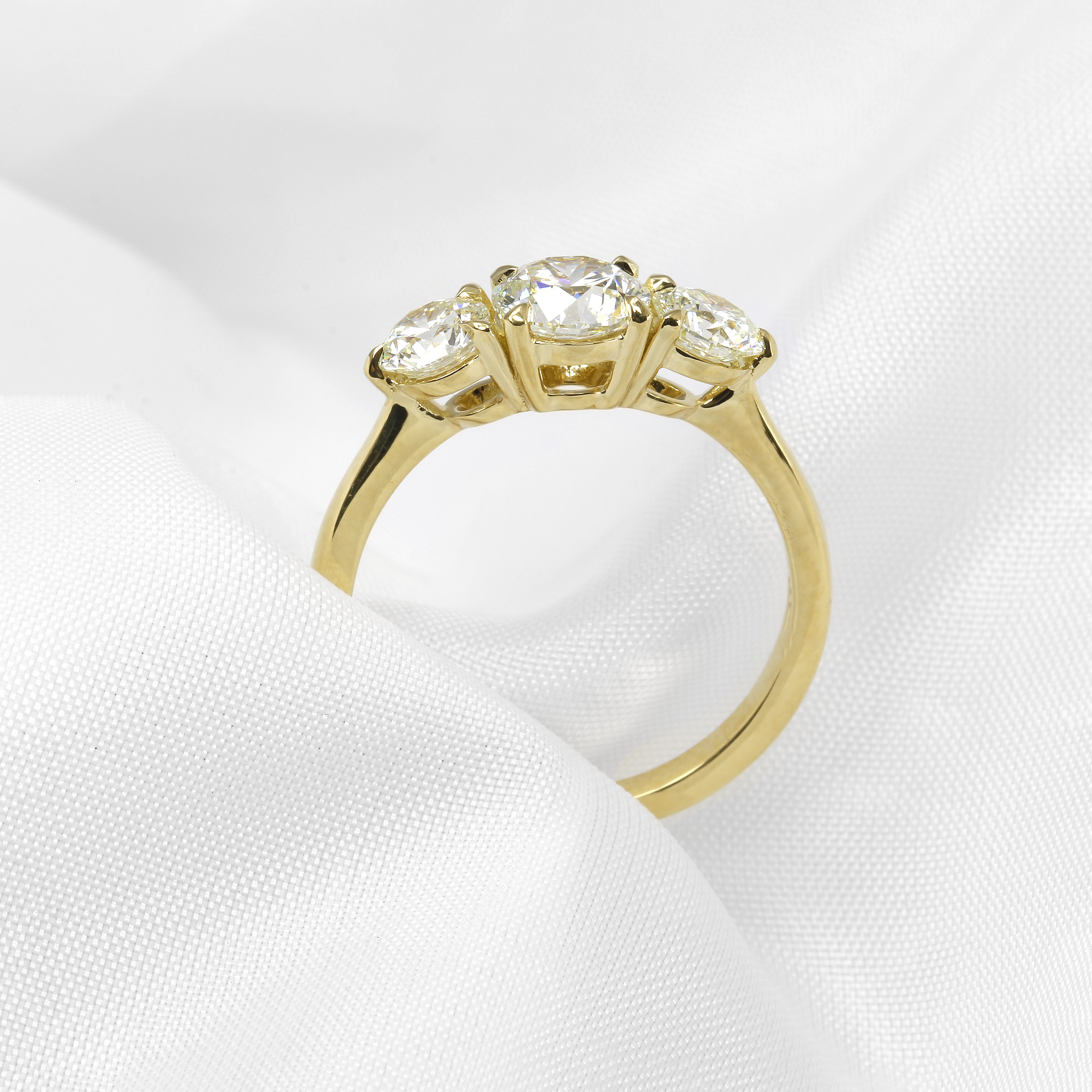 Claw Set Three Stone Diamond Ring in 18ct Yellow Gold