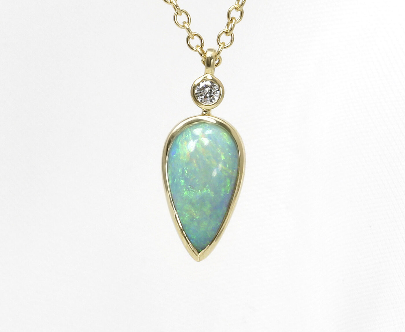 Pear Shape Australian Opal and Diamond Pendant