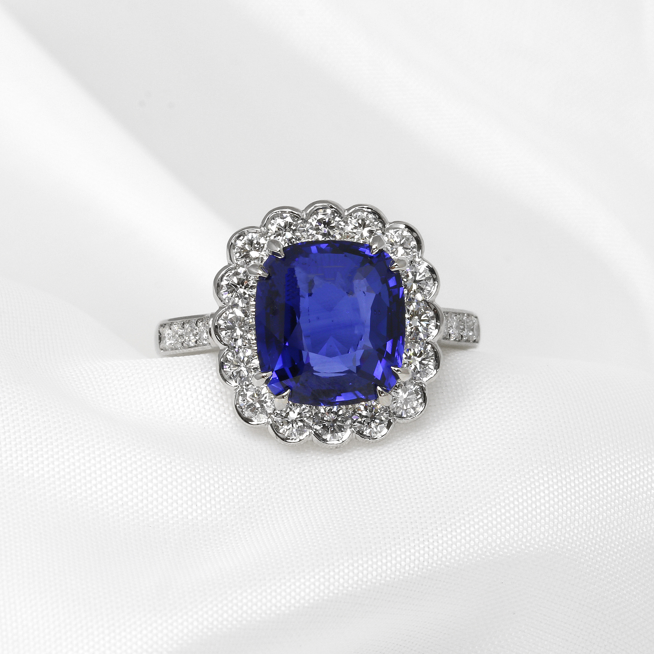 Cushion Cut Sapphire and Diamond Halo Cluster Ring in Platinum