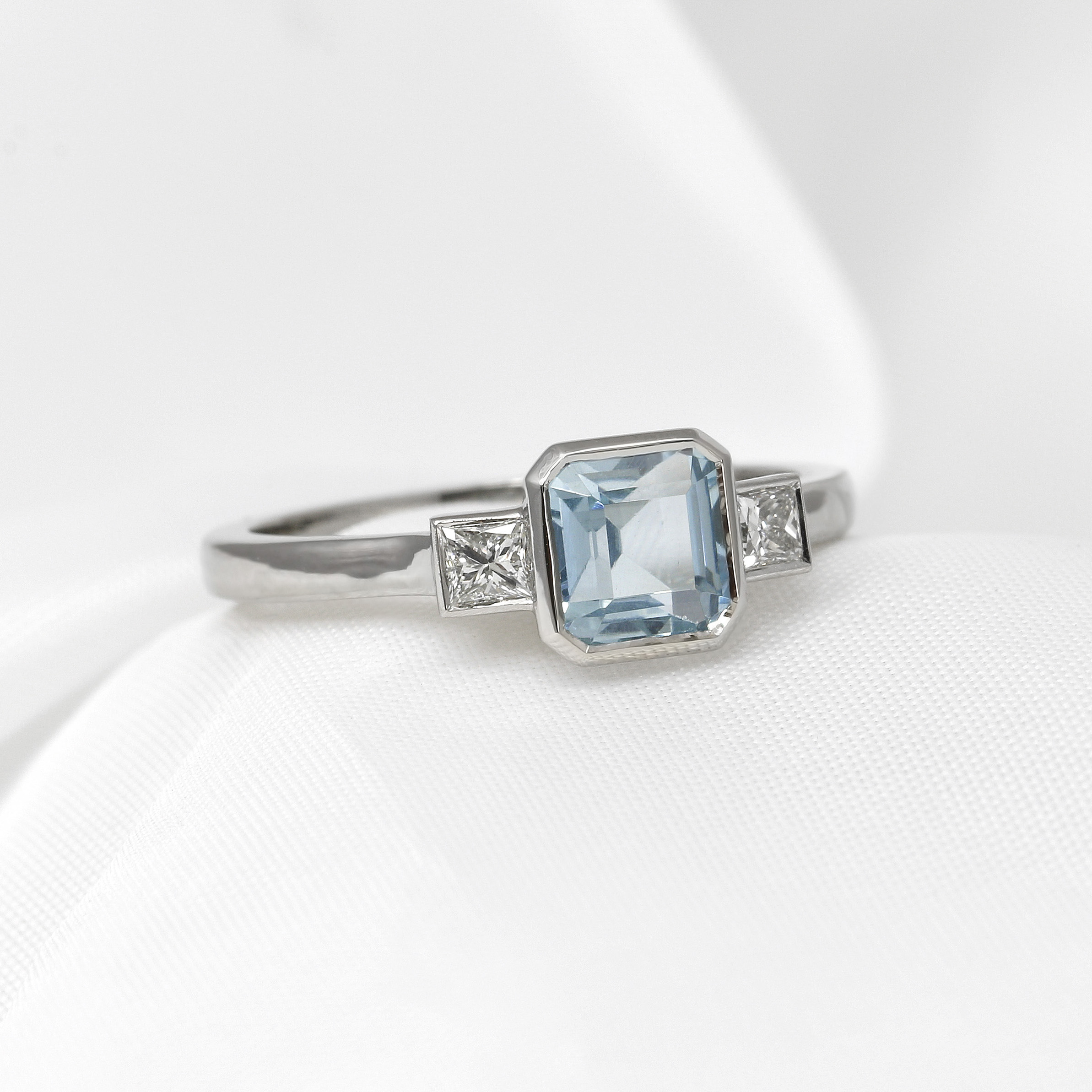 Aquamarine and Princess Cut Diamond Three Stone Ring in Platinum