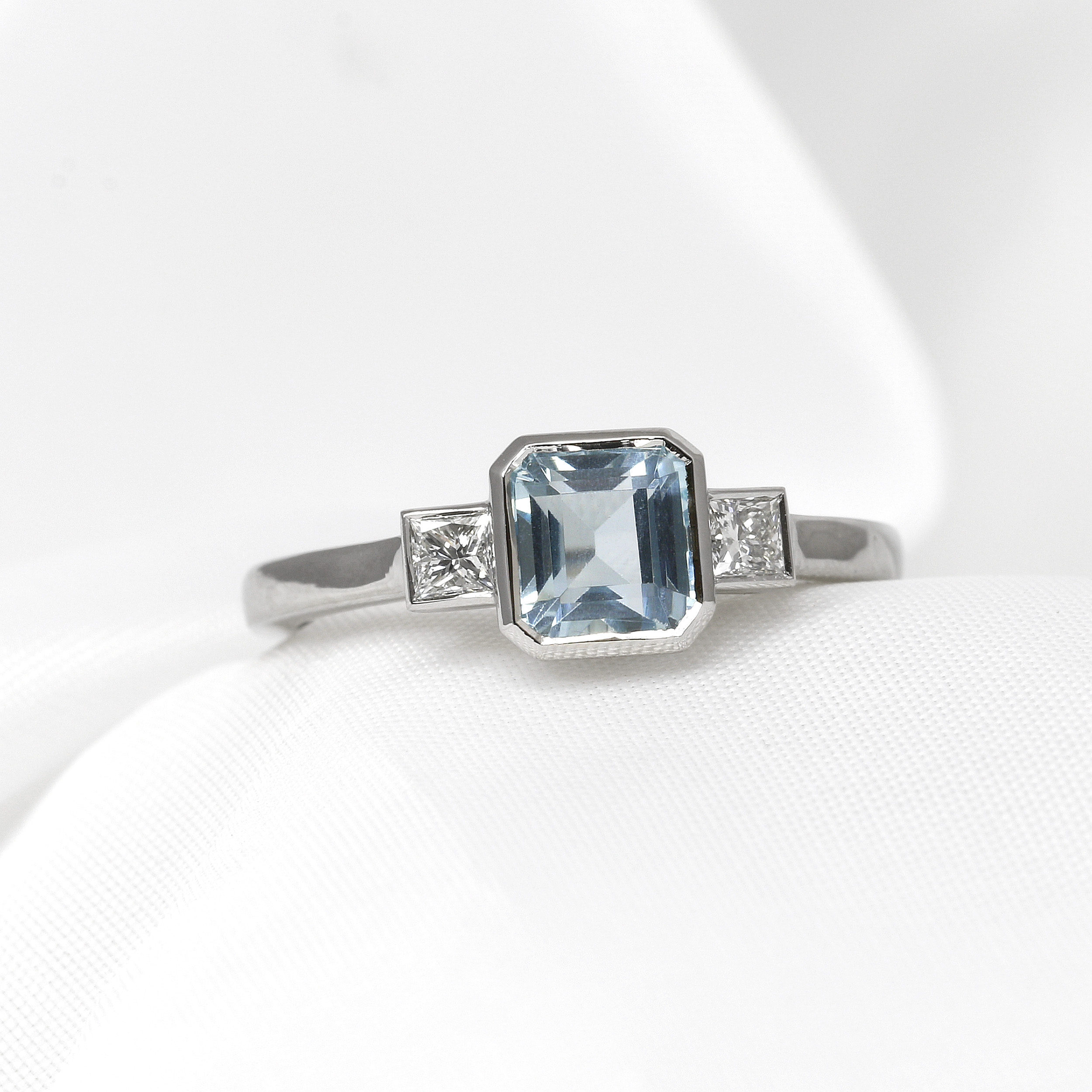 Aquamarine and Princess Cut Diamond Three Stone Ring in Platinum